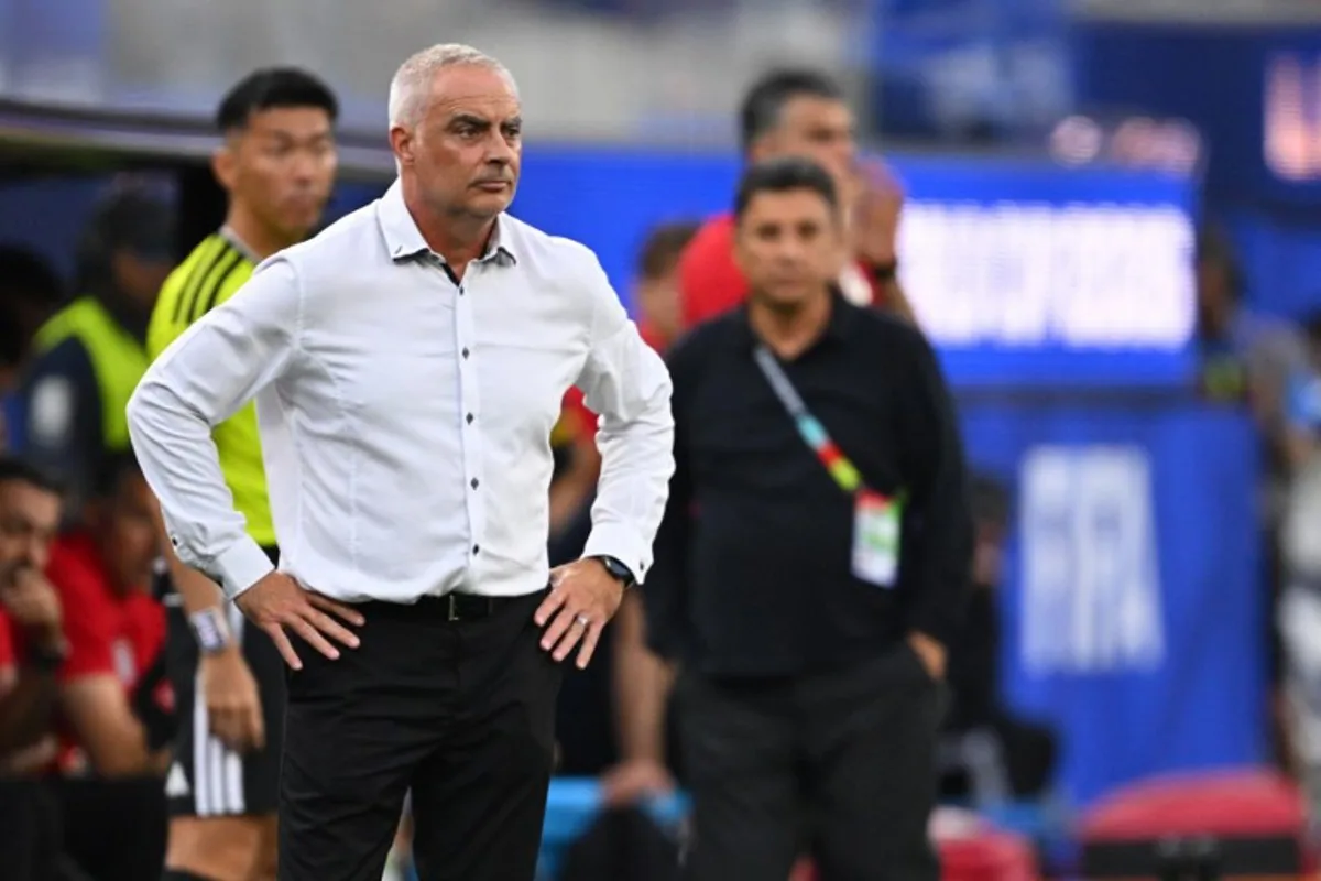 New Zealand's head coach Darren Bazeley watches his players from the touchline during the 2026 World Cup Group G football match between Iran and New Zealand at Los Angeles Stadium in Inglewood on June 15, 2026.   Patrick T. Fallon / AFP