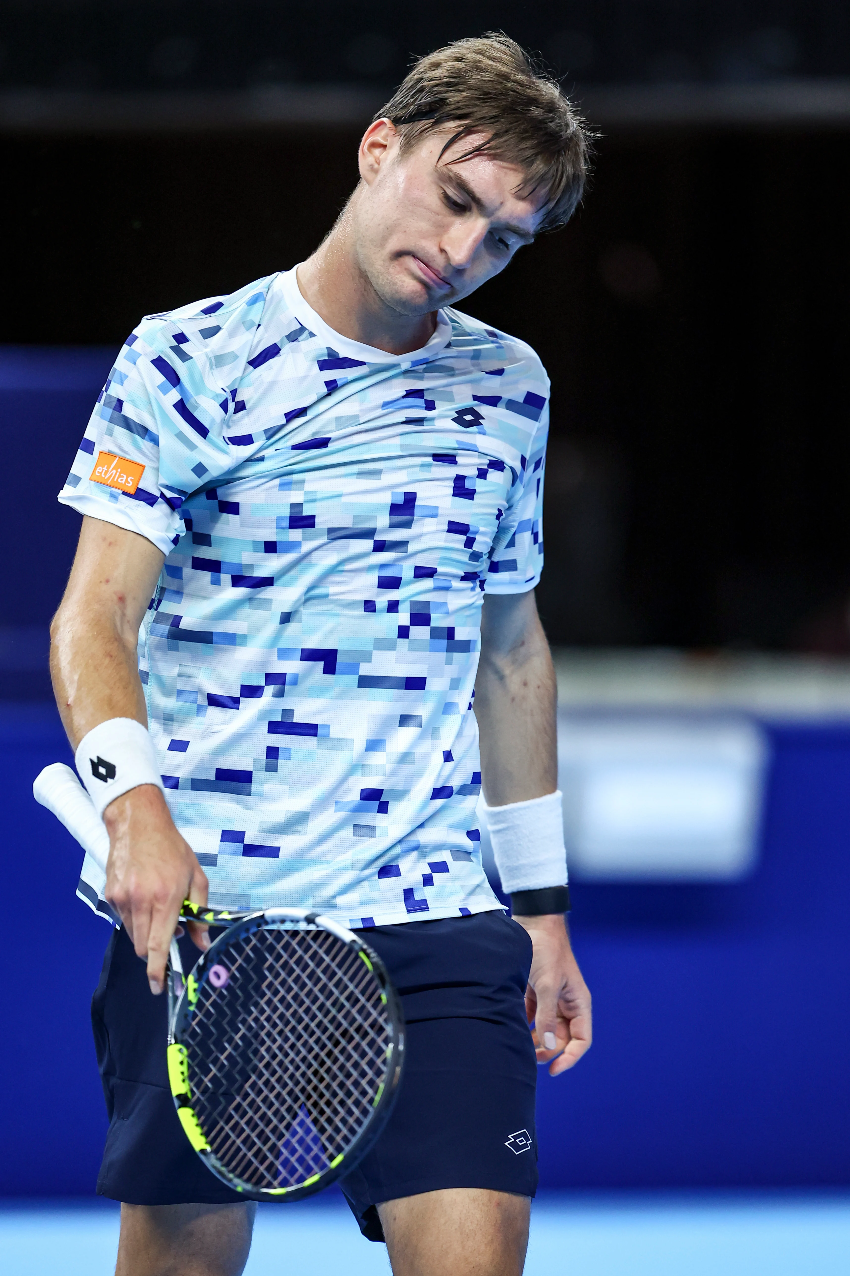 Belgian Raphael Collignon looks dejected during a tennis match in the round of 32 of the singles competition at the ATP European Open Tennis tournament in Antwerp, Monday 14 October 2024. BELGA PHOTO DAVID PINTENS