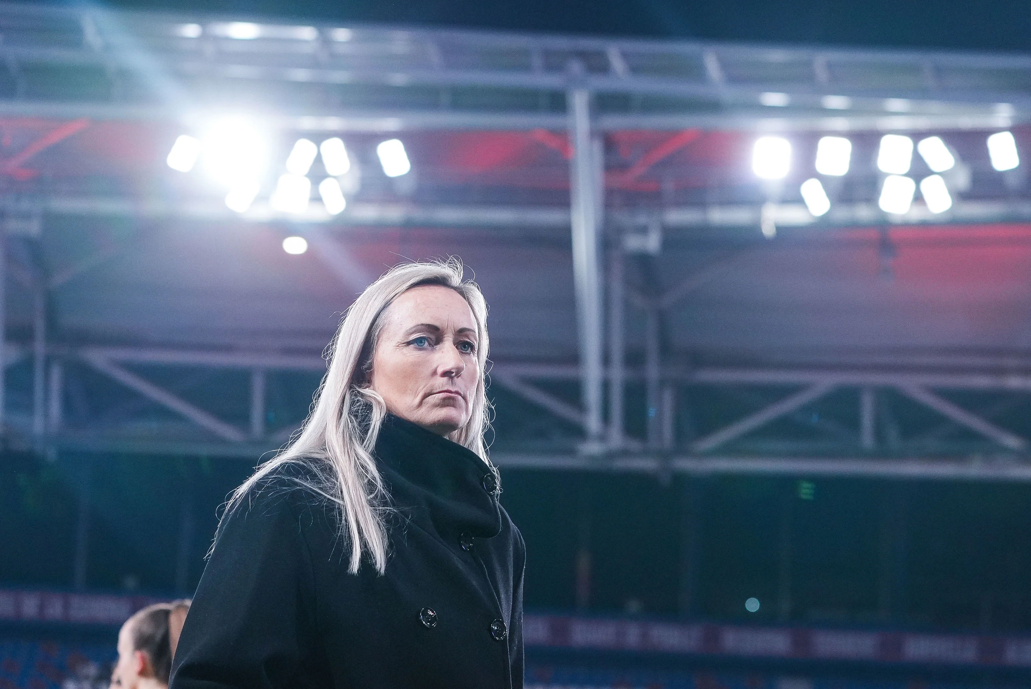 Belgium's head coach Elisabet Gunnarsdottir looks dejected after losing a soccer game between Belgium's national team the Red Flames and Spain, in Valencia, Spain Friday 21 February 2025, on the first matchday in group A3 of the 2024-25 Women's Nations League Competition. BELGA PHOTO JOMA GARCIA I GISBERT