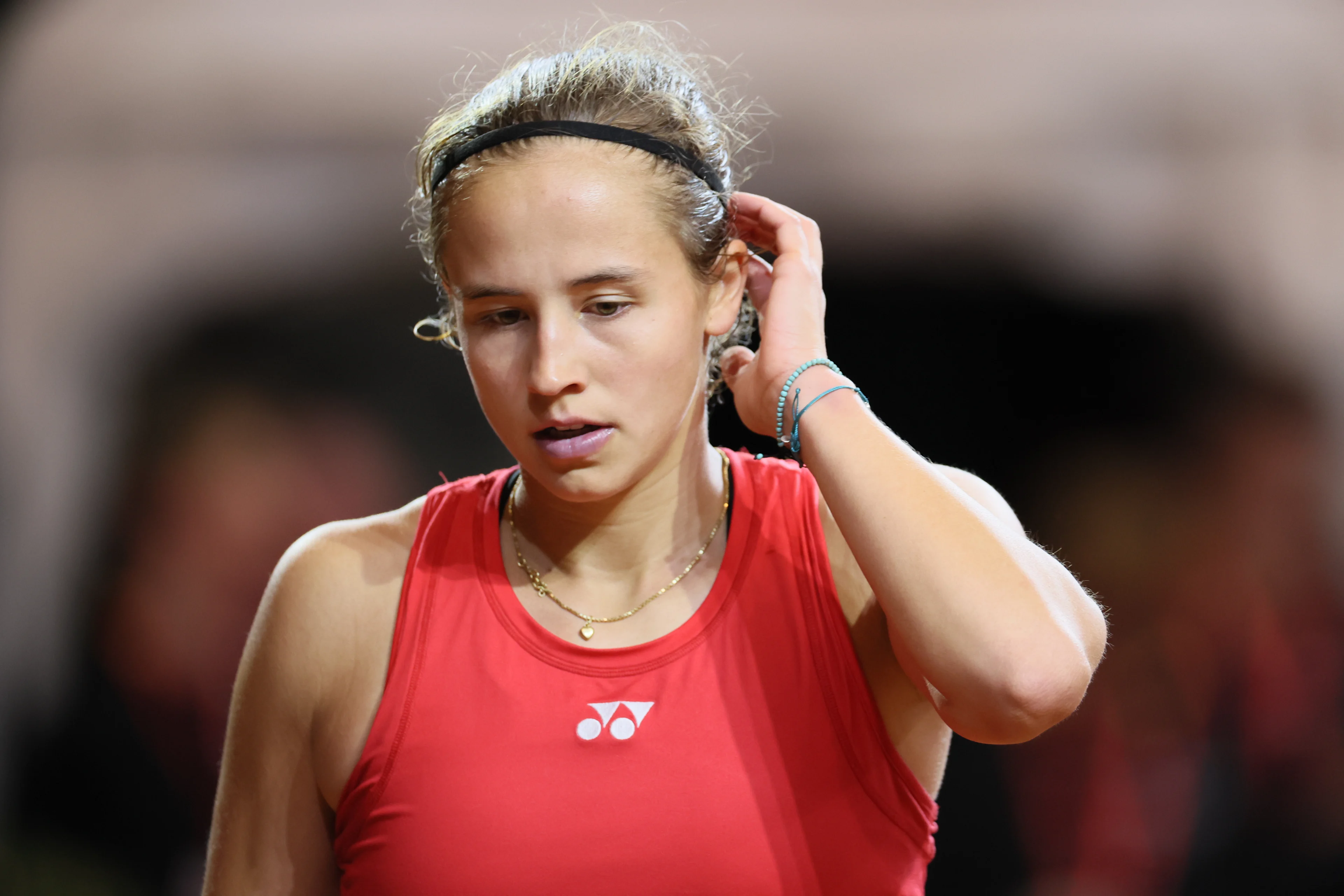 Belgian Hanne Vandewinkel reacts during the first game between Belgian Vandewinkel (WTA 94) and US' Jovic (WTA 16) on the first day of tennis matches between Belgium and USA, in the qualifiers of the Billie Jean King Cup tennis, in Oostende, Belgium, on Friday 10 April 2026. The meeting takes place on 10 and 11th April. PHOTO BENOIT DOPPAGNE