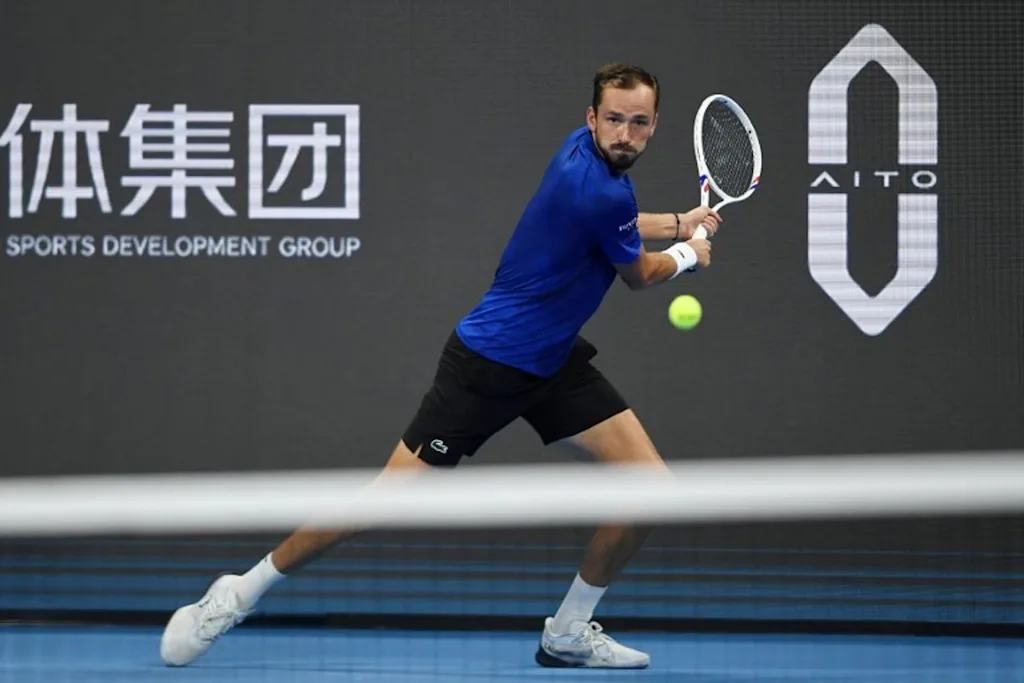 Russia's Daniil Medvedev hits a return to Hong Kong's Coleman Wong during their men's singles quarter-final match at the Hangzhou Open tennis tournament in Hangzhou, in China's eastern Zhejiang province on September 27, 2026.  STR / AFP