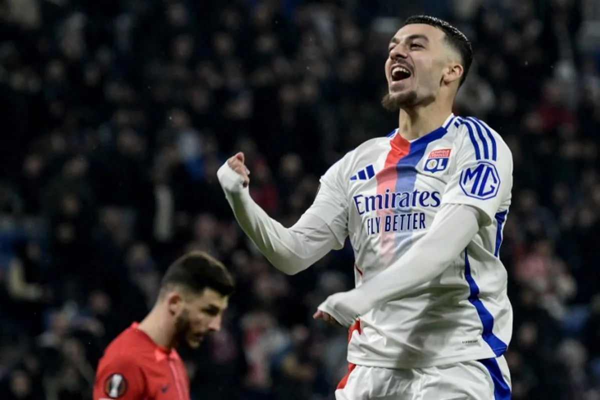 Lyon's Georgian #69 Georges Mikautadze celebrates scoring his team's third goal during the second leg of last 16 UEFA Europa League football match between Olympique Lyonnais (OL) (FRA) and Steaua Bucharest FCSB (ROM) at the Parc Olympique Lyonnais in Decines-Charpieu, south-eastern France on March 13, 2025. JEAN-PHILIPPE KSIAZEK / AFP