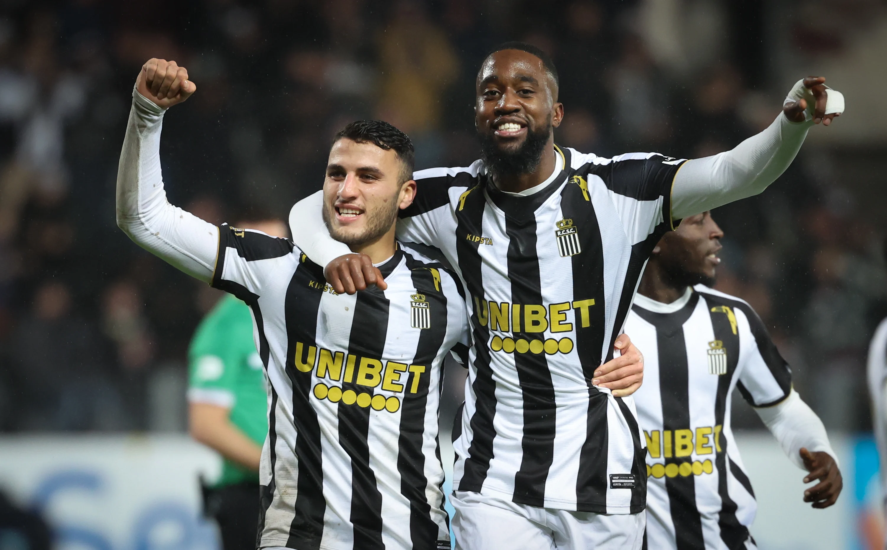 Charleroi's Yacine Titraoui and Charleroi's Isaac Mbenza celebrate after scoring during a soccer match between Sporting Charleroi and Sint-Truiden VV, Saturday 21 December 2024 in Charleroi, on day 19 of the 2024-2025 season of the 'Jupiler Pro League' first division of the Belgian championship. BELGA PHOTO VIRGINIE LEFOUR