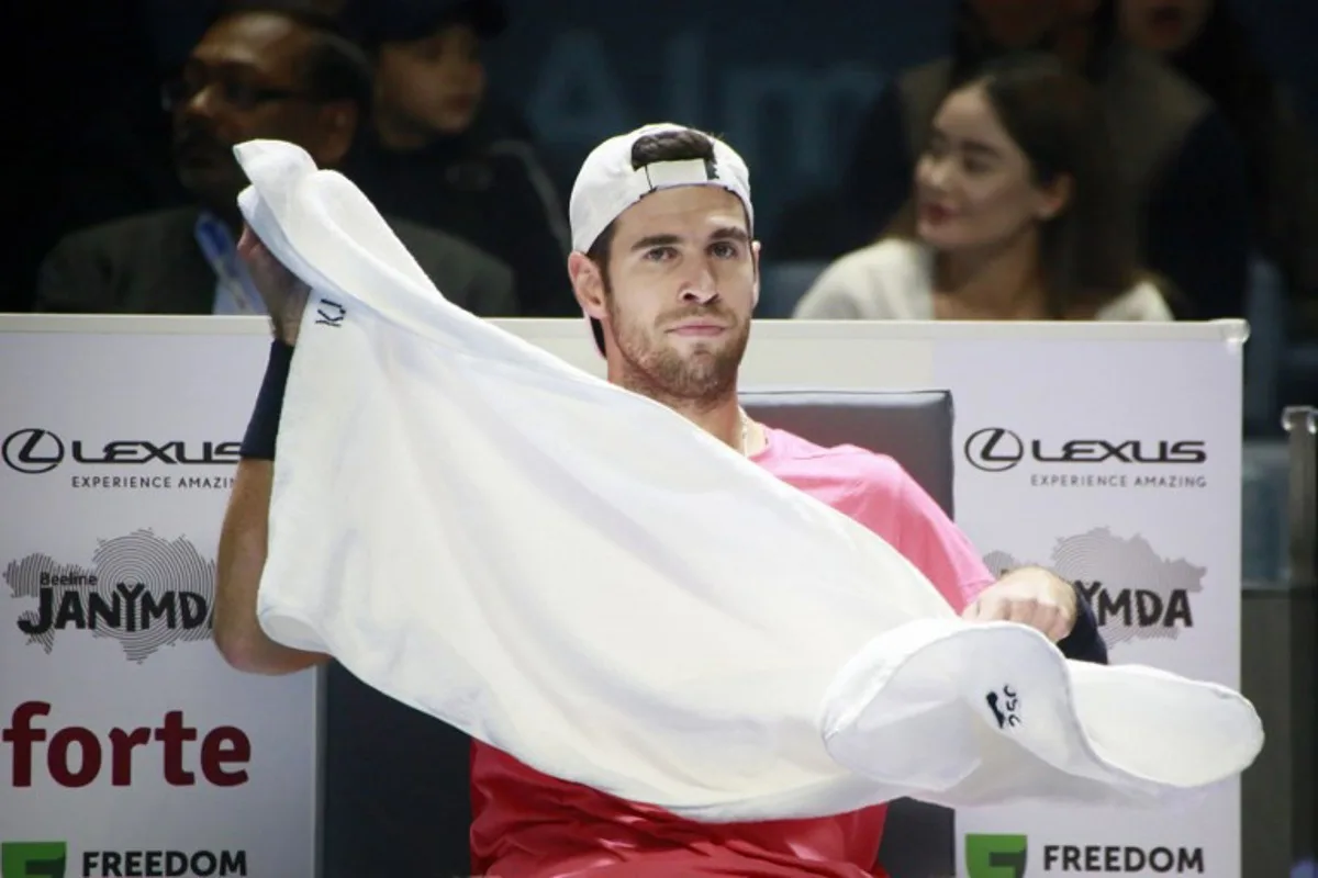 Russia's Karen Khachanov rests in a break during the men's singles final match against Canada's Gabriel Diallo at the ATP Almaty Open tennis tournament, in Almaty on October 20, 2024. Ruslan PRYANIKOV / AFP