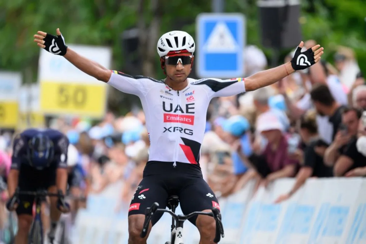 UAE Team Emirates-XRG's Ecuadorian rider Jhonatan Narvaez celebrates crossing the finish line to win in the third stage, 157,4 km from Bad Ragaz to Bad Ragaz, of the Men's Tour of Switzerland (Tour de Suisse) cycling race in Bad Ragaz on June 19, 2026. HAROLD CUNNINGHAM / AFP