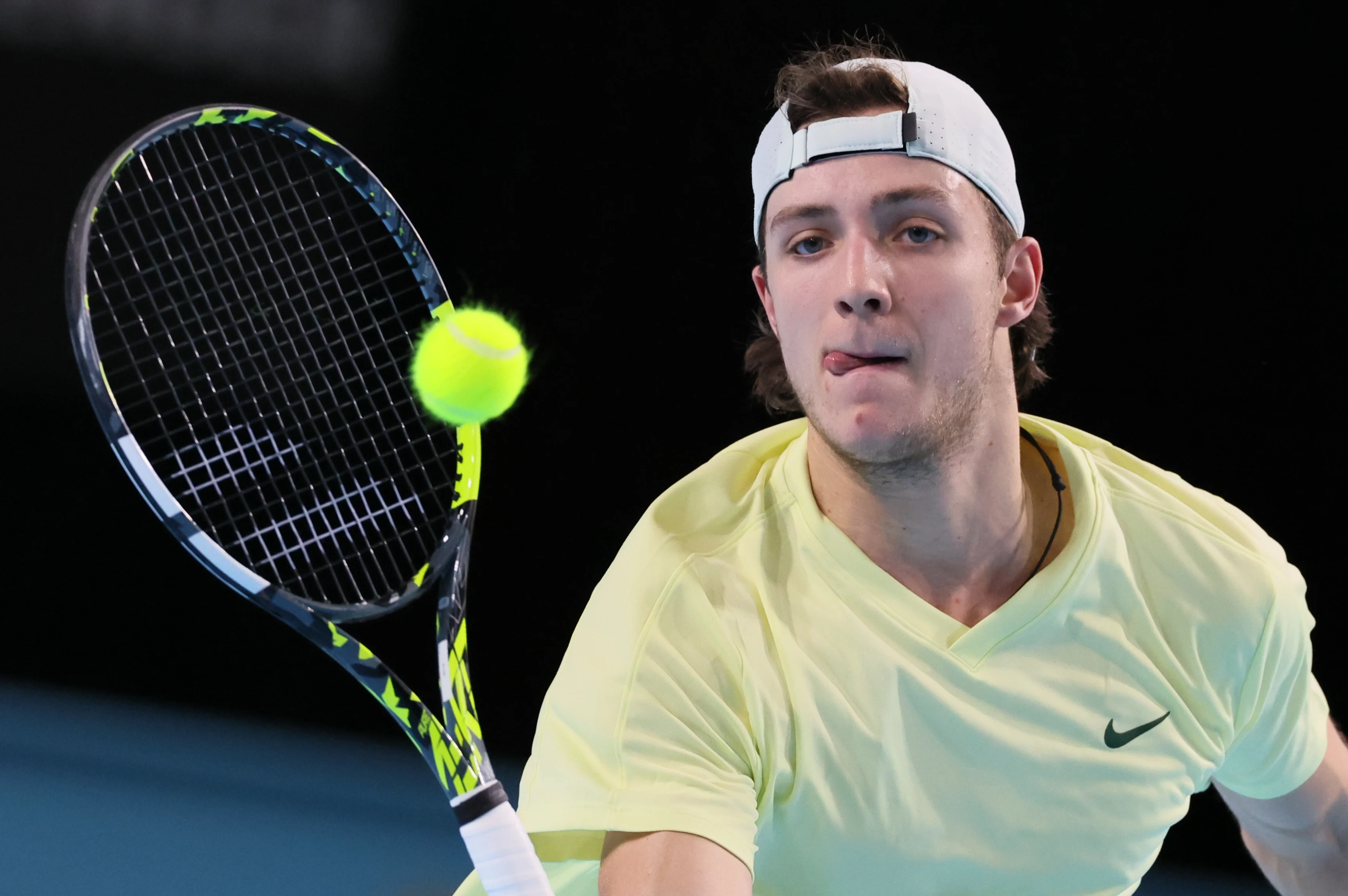 Belgian Tibo Colson pictured in action during a tennis match against German Squire, a qualification match for the men's singles at the BW Open ATP Challenger 125 tournament, in Louvain-la-Neuve,  Monday 22 January 2024. THE BW Open takes place from 22 to 28 January.  BELGA PHOTO BENOIT DOPPAGNE