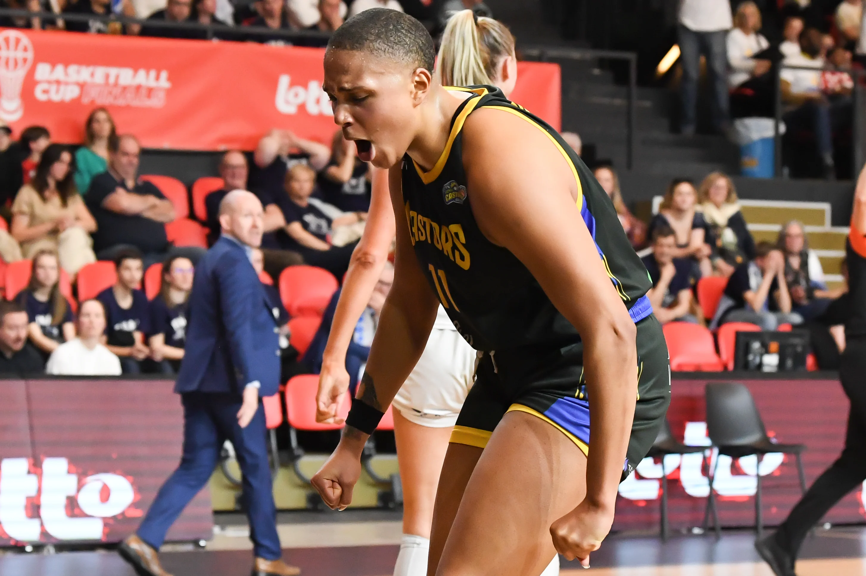 Castors' Jaquaya Miller celebrates during a basketball match between Kangoeroes Mechelen and Castors Braine, Saturday 08 March 2025 in Oostende, the final of the women's Belgian Basketball Cup. BELGA PHOTO JILL DELSAUX