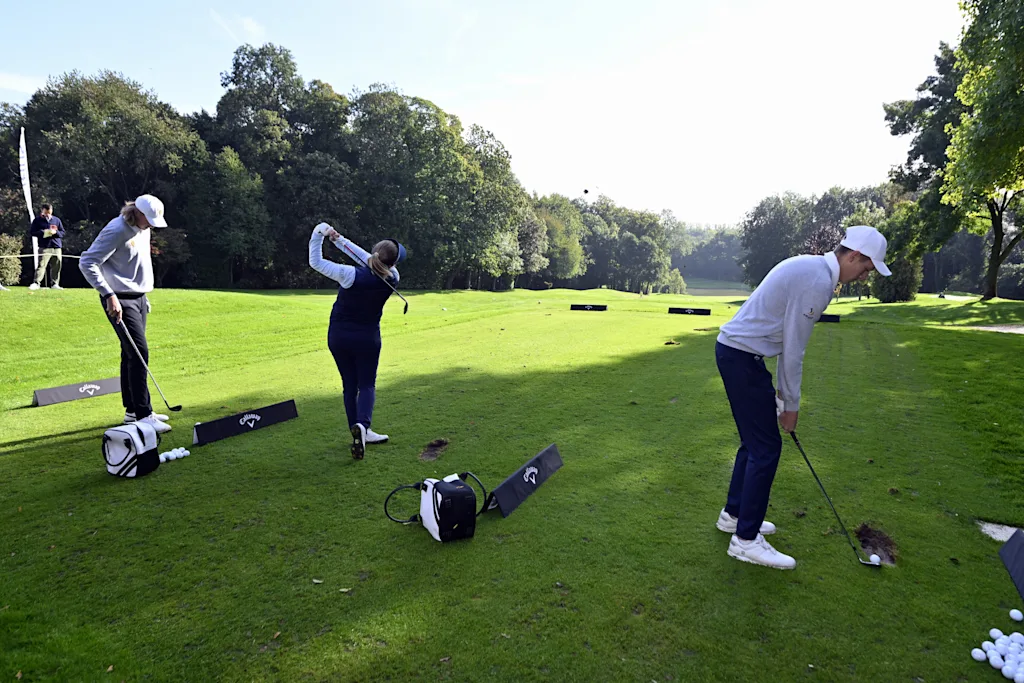 golf player Ryan Lundh, Golf player Manon De Roey and Golf Player Hugo Duquaine pictured during the 'Golf to Paris' event organised by the BOIC-COIB Belgian olympic committee, Tuesday 4 October 2022, in La Tournette golf in Nivelles. BELGA PHOTO ERIC LALMAND