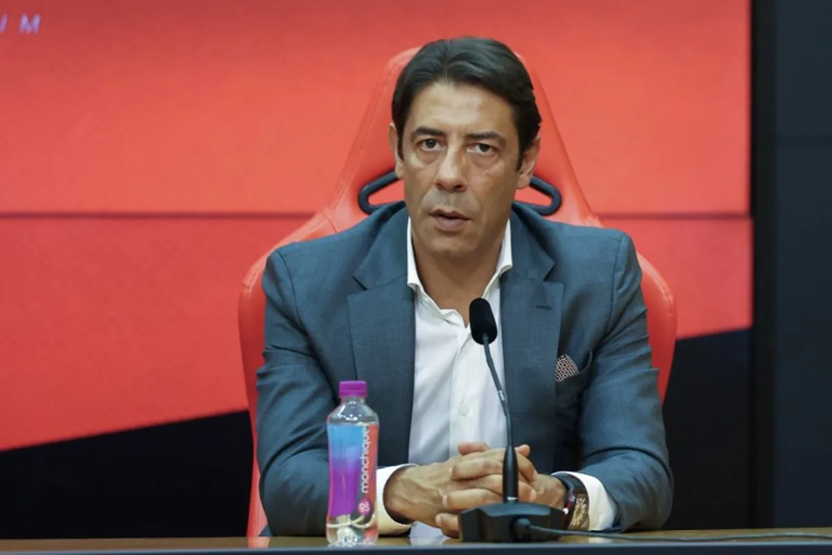 Benfica president Rui Costa looks on during a press conference of the official presentation of new Benfica coach Jose Mourinho at the Benfica Campus training center in Seixal, on the outskirts of Lisbon, on September 18, 2025. Benfica sacked Portuguese coach Bruno Lage following their defeat to Qarabag on September 16, 2025 evening in the Champions League, and contacted Jose Mourinho the next day to hire him. PATRICIA DE MELO MOREIRA / AFP