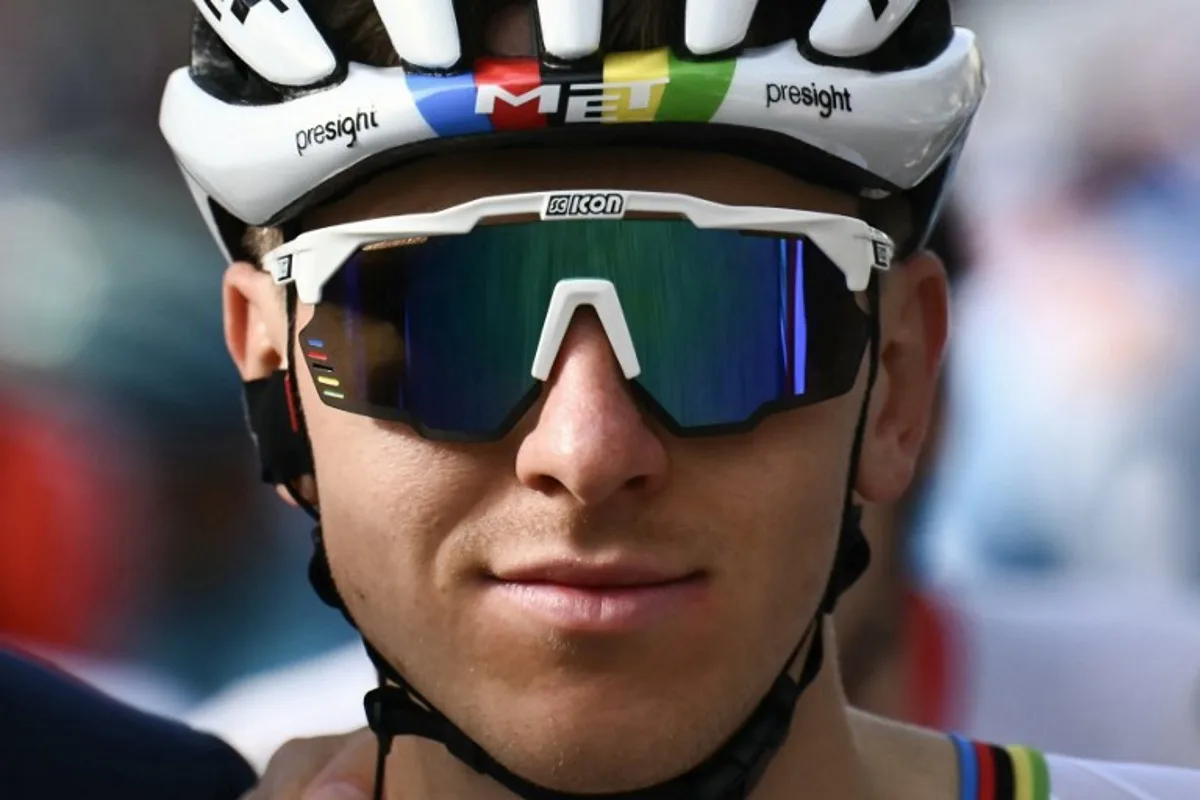 UAE Team Emirates team's Slovenian rider Tadej Pogacar looks on at the start of 118th edition of the Giro di Lombardia (Tour of Lombardy), a 252km cycling race from Bergamo to Como on October 12, 2024.  Marco BERTORELLO / AFP