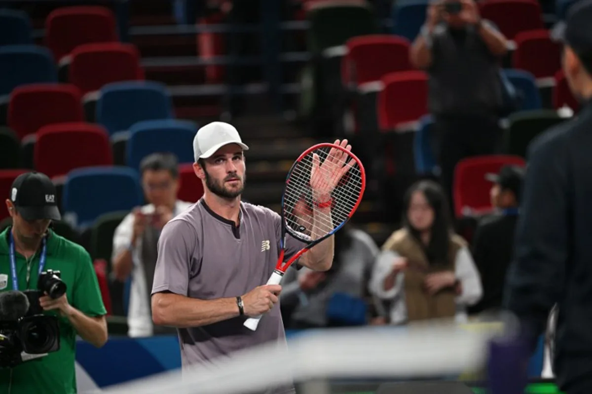 USA's Tommy Paul celebrates after winning against Chile's Alejandro Tabilo during their men's singles match at the Shanghai Masters tennis tournament in Shanghai on October 6, 2024.  HECTOR RETAMAL / AFP