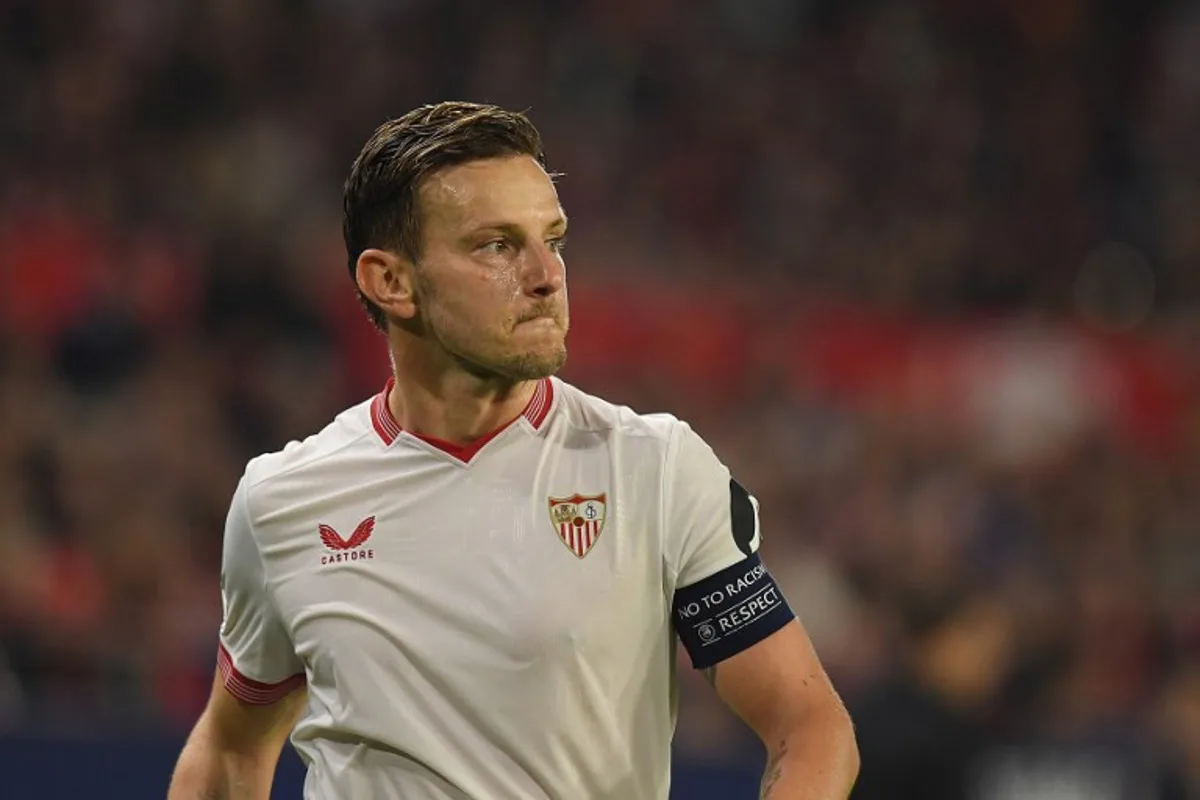 Sevilla's Croatian midfielder #10 Ivan Rakitic reacts during the UEFA Champions League first round group B football match between Sevilla FC and PSV Eindhoven at the Ramon Sanchez Pizjuan stadium in Seville on November 29, 2023. JORGE GUERRERO / AFP