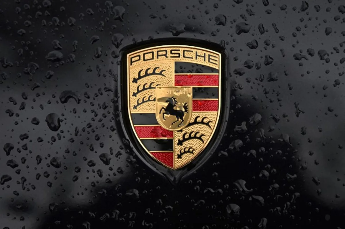 This photographgraph taken on January 10, 2023 shows the logo of German car manufacturer Porsche, in Paris. Emmanuel DUNAND / AFP