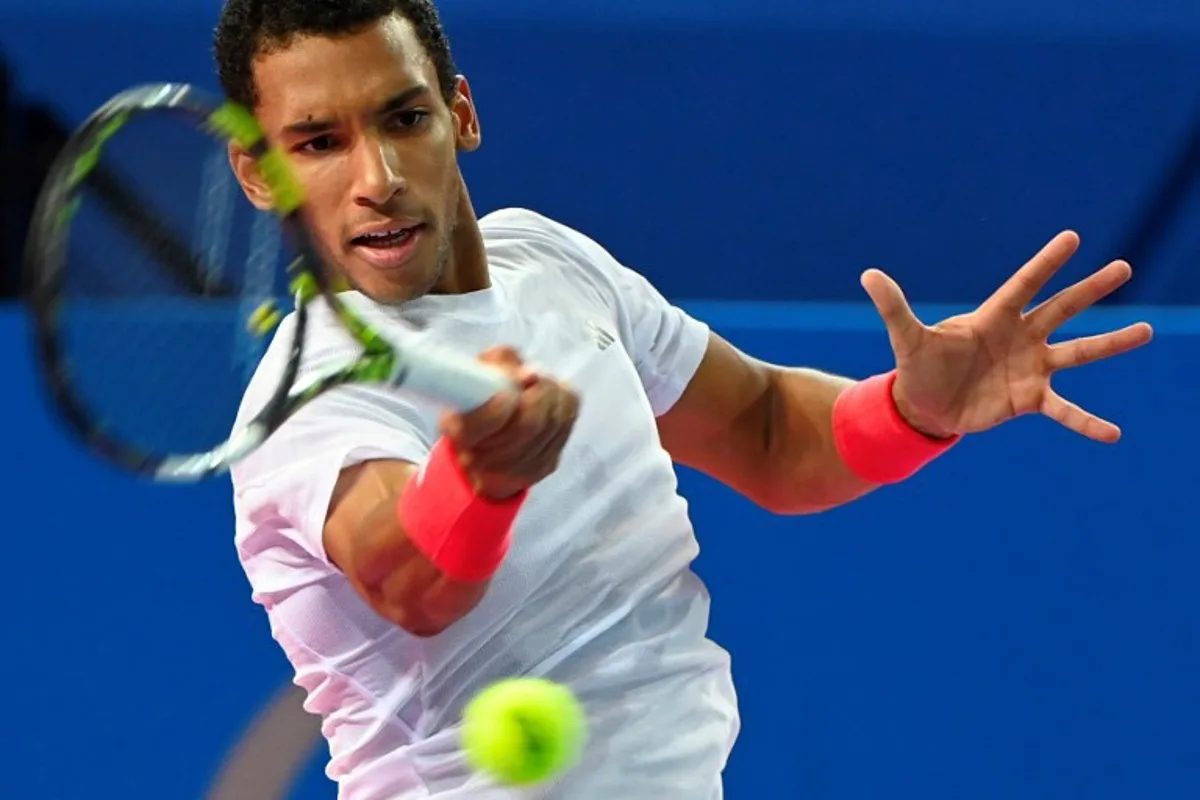 Canada's Felix Auger Aliassime returns the ball to US' Aleksandar Kovacevic during their  ATP World Tour Open Occitanie Men's final tennis match, in Montpellier, southern France on February 2, 2025.   Sylvain THOMAS / AFP