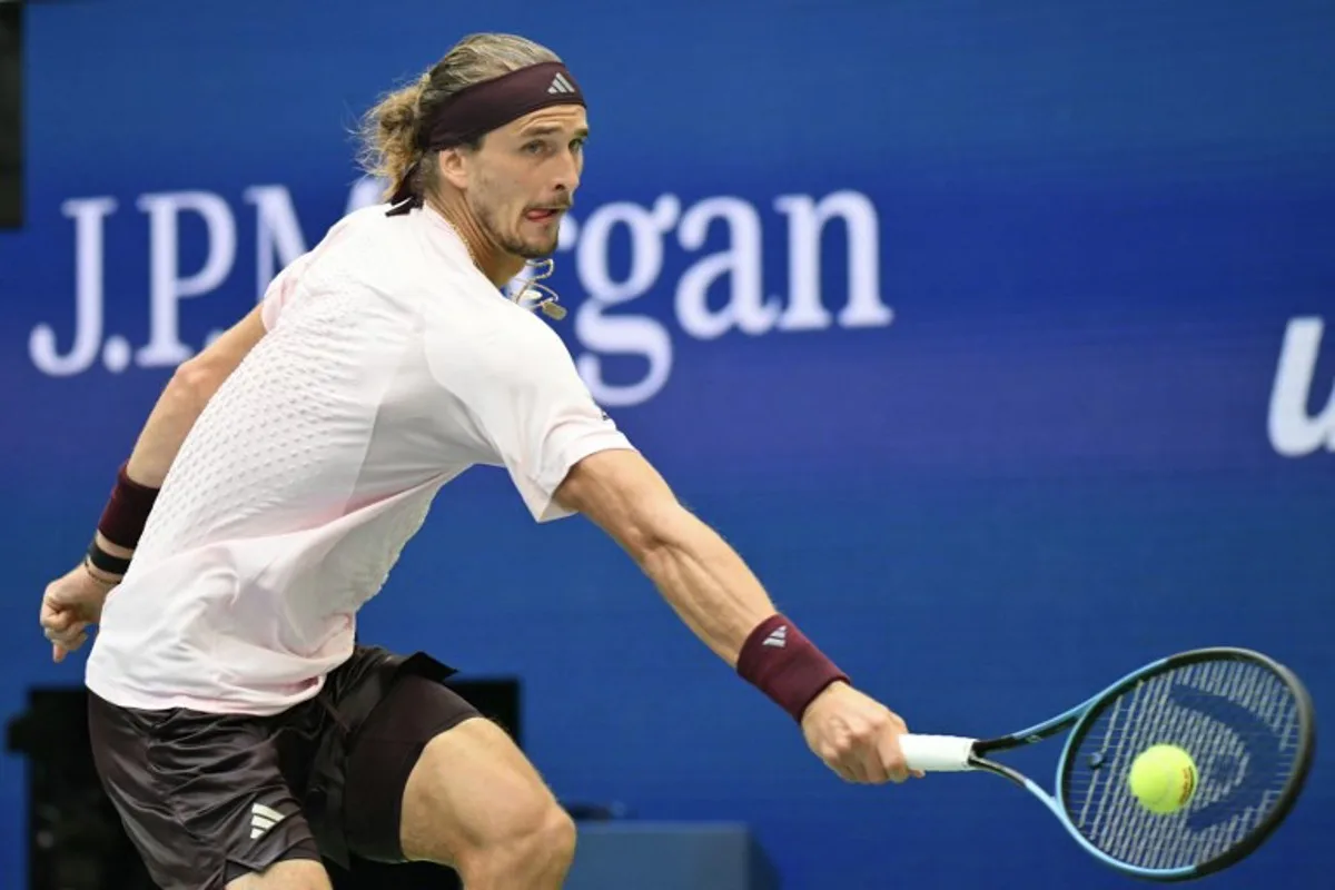 Germany's Alexander Zverev hits a return to USA's Ben Shelton during the men's singles final tennis match on day fifteen of the US Open tennis tournament at the USTA Billie Jean King National Tennis Center in New York on September 13, 2026.  ANGELA WEISS / AFP