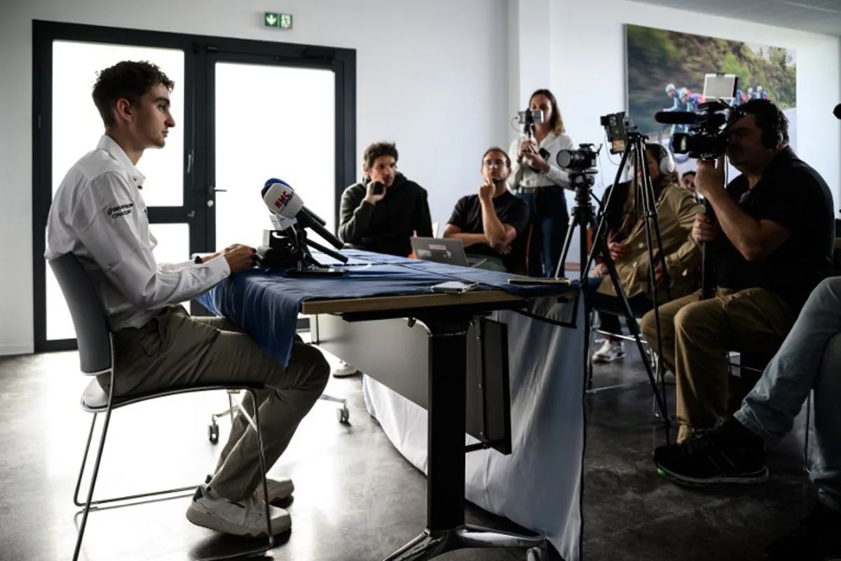 Decathlon CMA-CGM team's French rider Paul Seixas delivers remarks to journalists during a press conference at team's performance headquarters in La Motte-Servolex, central-eastern France, on May 6, 2026. French teenage prodigy Paul Seixas announced on May 4 that he will ride the Tour de France in July for the first time, raising hopes of a first home winner in more than four decades. JEFF PACHOUD / AFP