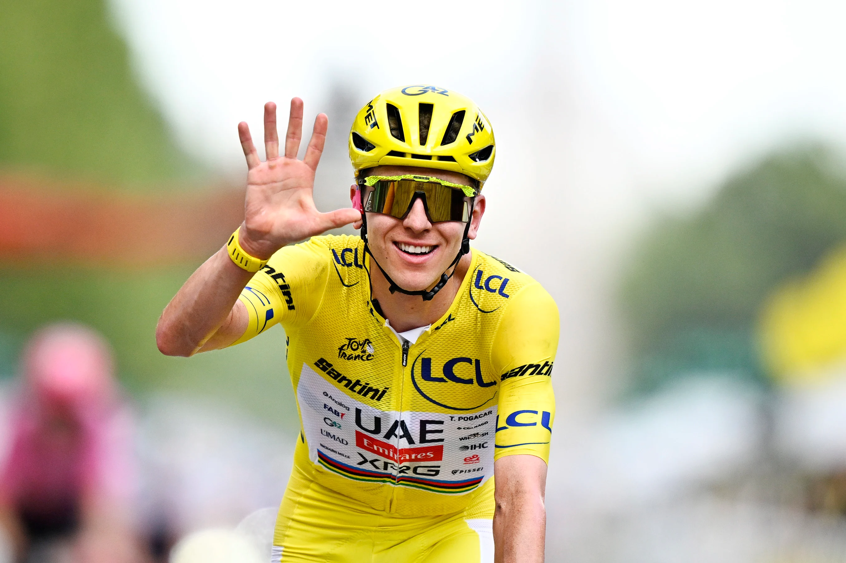 Slovenian Tadej Pogacar of UAE Team Emirates-XRG celebrates as he crosses the finish line at stage 21 of the 2026 Tour de France cycling race, a stage of 130km from Thoiry to Paris Champs-Elysees , on Sunday 26 July 2026. The 113th edition of the Tour de France starts on Saturday 4 July in Barcelona, Spain, and will finish in Paris, France on the 26th of July. BELGA PHOTO JASPER JACOBS