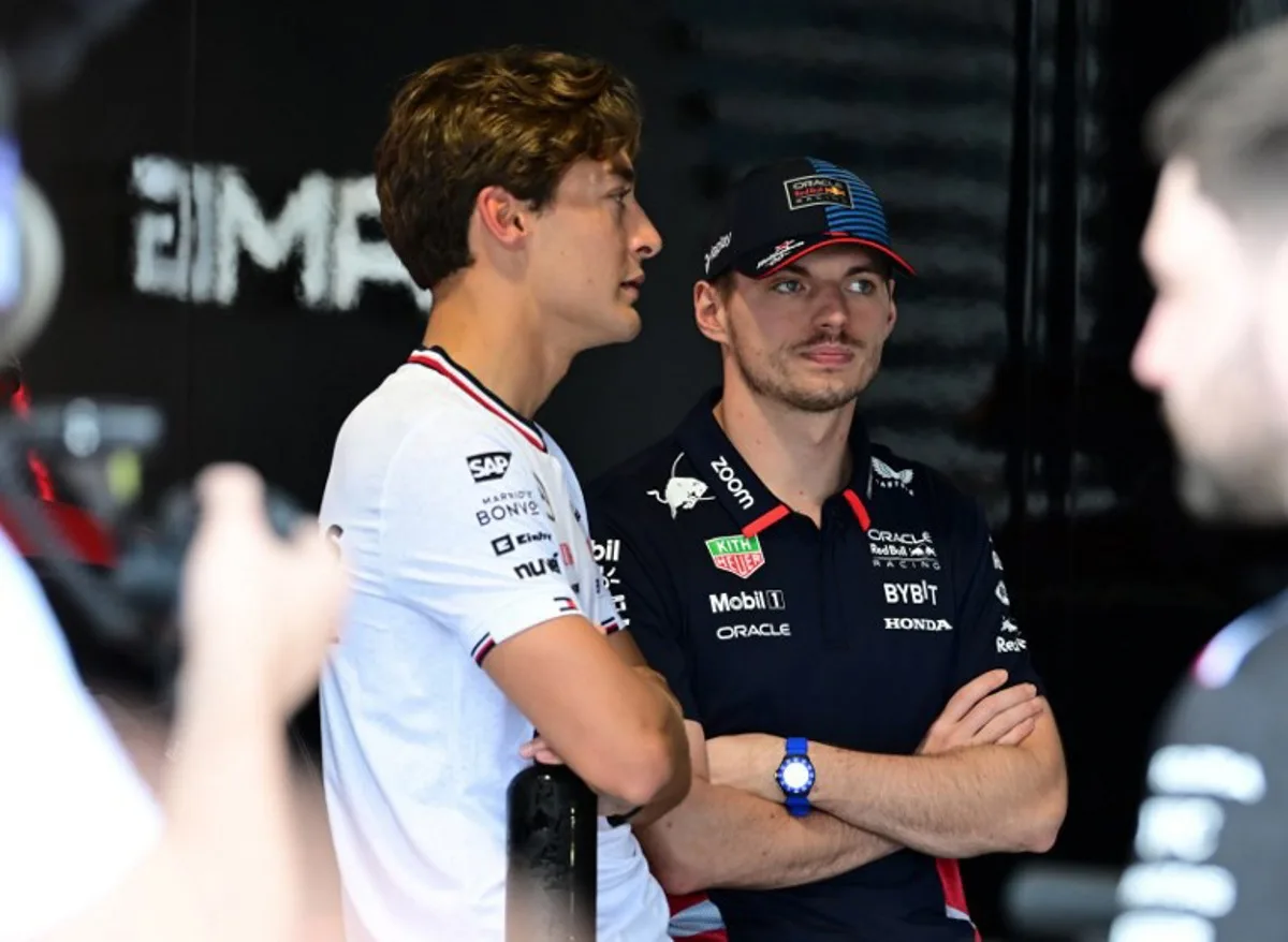 Mercedes' British driver George Russell (L) and Red Bull Racing's Dutch driver Max Verstappen wait for Driver's Parade before the 2024 Miami Formula One Grand Prix at Miami International Autodrome in Miami Gardens, Florida, on May 5, 2024.   GIORGIO VIERA / AFP