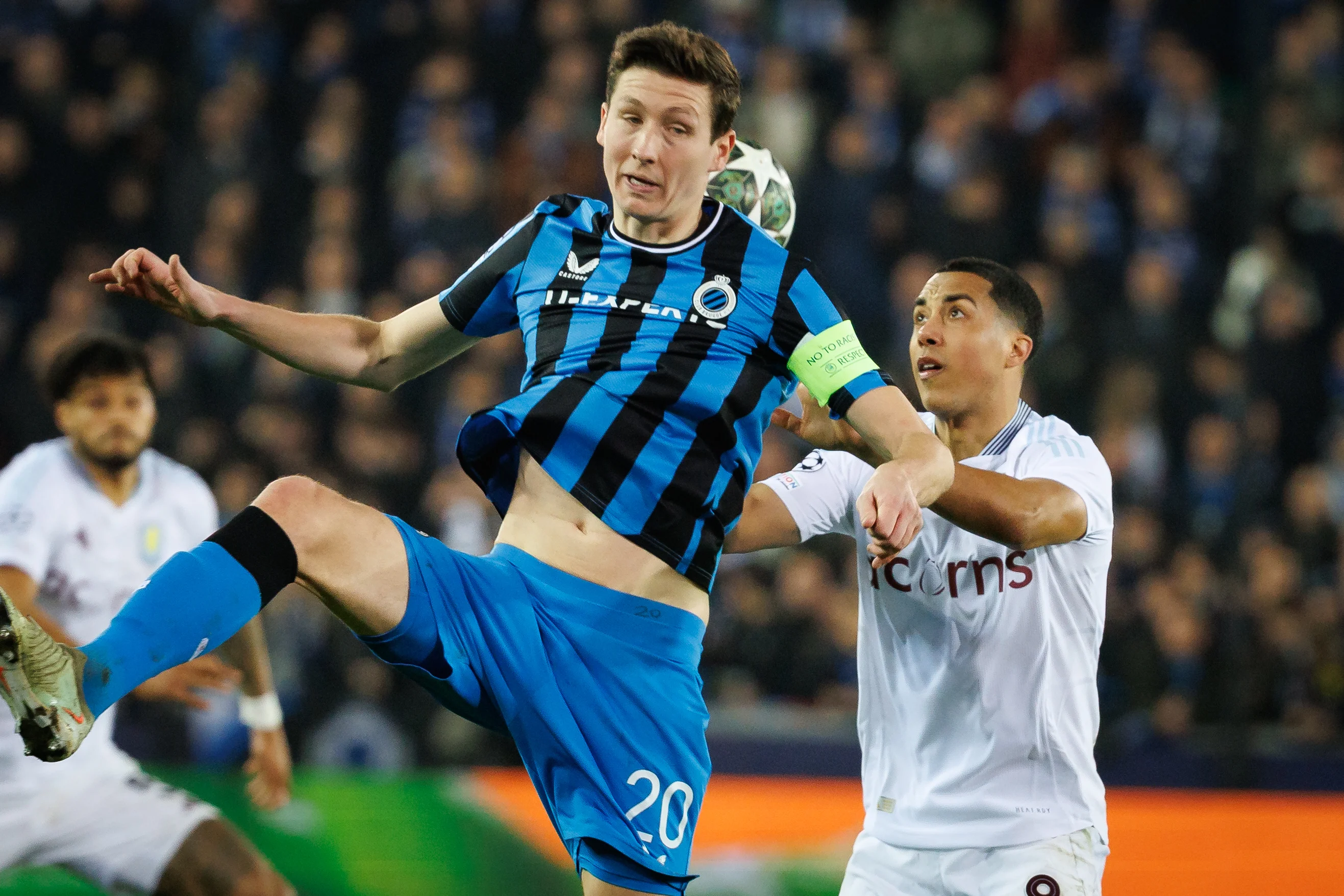 Club's Hans Vanaken and Aston Villa's Youri Tielemans fight for the ball during a soccer game between Belgian Club Brugge KV and English Aston Villa FC, Tuesday 04 March 2025 in Brugge, the first leg of the 1/8 finals of the UEFA Champions League knockout phase. BELGA PHOTO KURT DESPLENTER