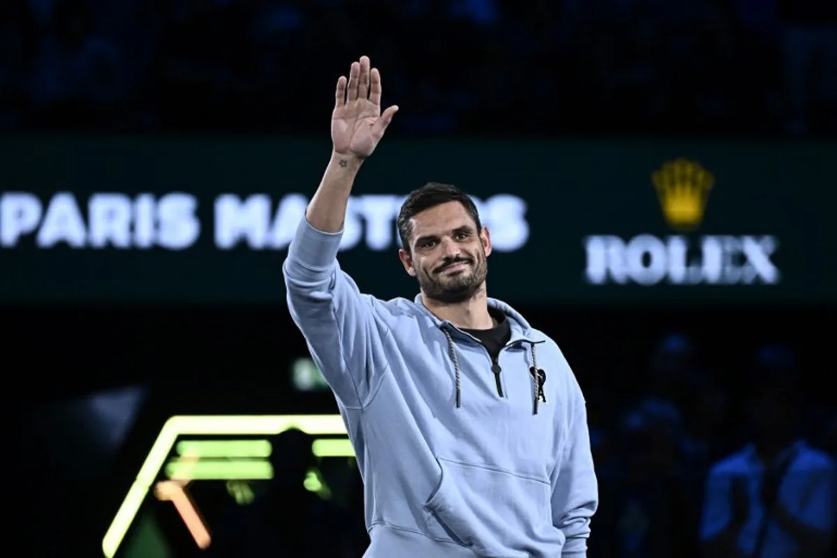 French swimmer Florent Manaudou arrives for the medal ceremony at the end of the men's singles final match on day seven of the Paris ATP Masters 1000 tennis tournament at the Accor Arena - Palais Omnisports de Paris-Bercy - in Paris on November 3, 2024. JULIEN DE ROSA / AFP