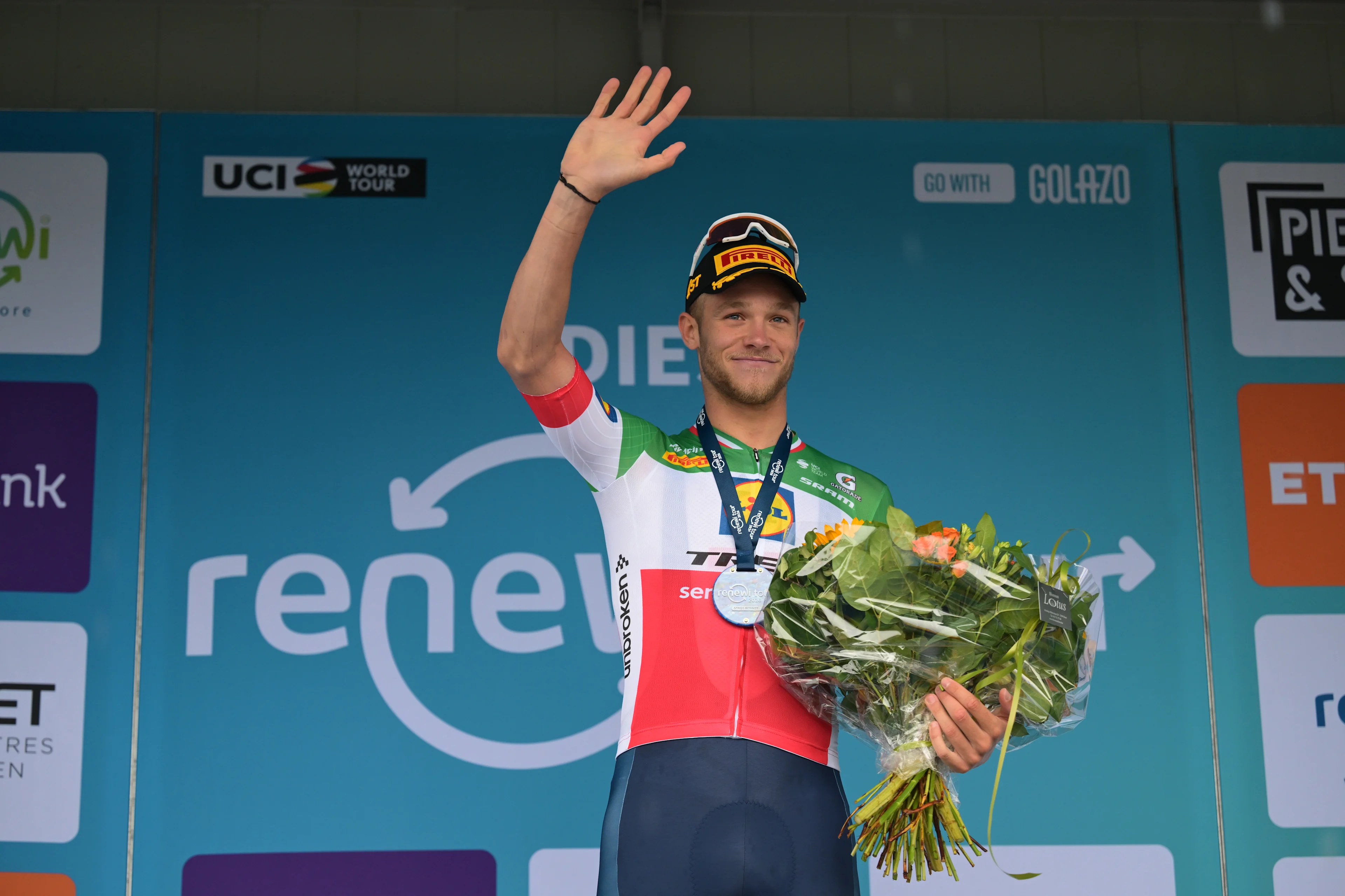 Winner Italian Jonathan Milan of Lidl-Trek celebrates on the podium of the first stage of the 'Renewi Tour' multi-stage cycling race, from Diest and back (191,3 km) on Wednesday 19 August 2026. The five-day race takes place from 19 to 23/08. BELGA PHOTO DAVID PINTENS