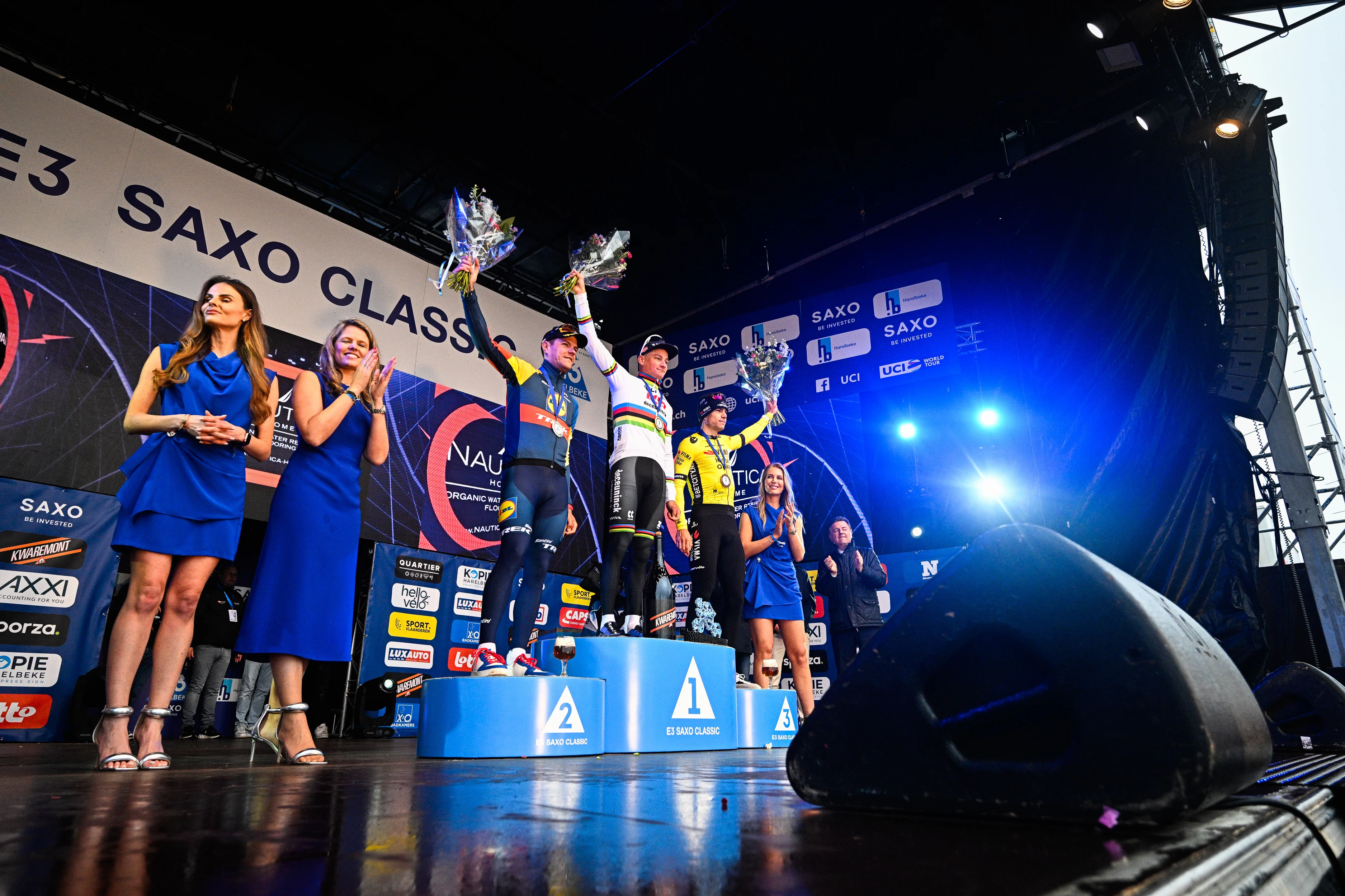 Belgian Jasper Stuyven of Lidl-Trek, Dutch Mathieu van der Poel of Alpecin-Deceuninck and Belgian Wout van Aert of Team Visma-Lease a Bike pictured on the podium after the 'E3 Saxo Bank Classic' one day cycling race, 207km from and to Harelbeke, Friday 22 March 2024. BELGA PHOTO JASPER JACOBS