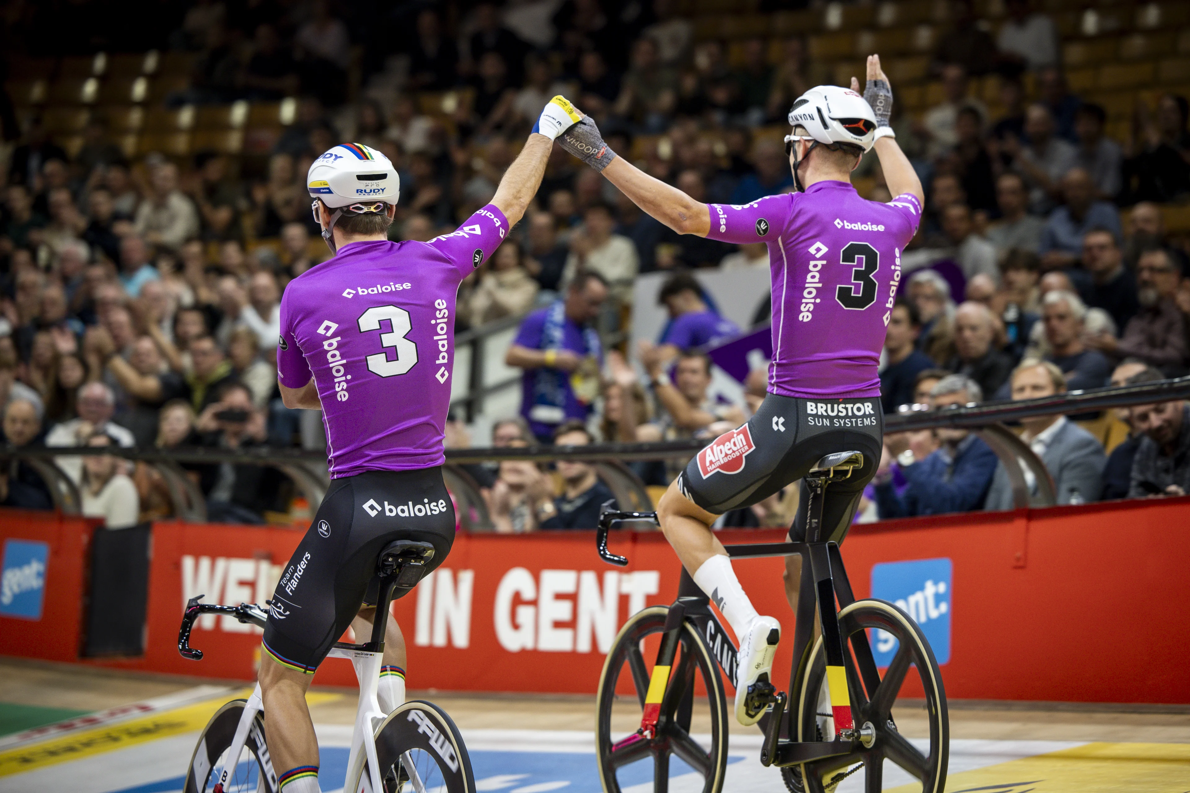 Belgian Robbe Ghys and Belgian Lindsay De Vylder pictured during day four of the Zesdaagse Vlaanderen-Gent six-day indoor track cycling event at the indoor cycling arena 't Kuipke, Friday 15 November 2024, in Gent. BELGA PHOTO DAVID PINTENS