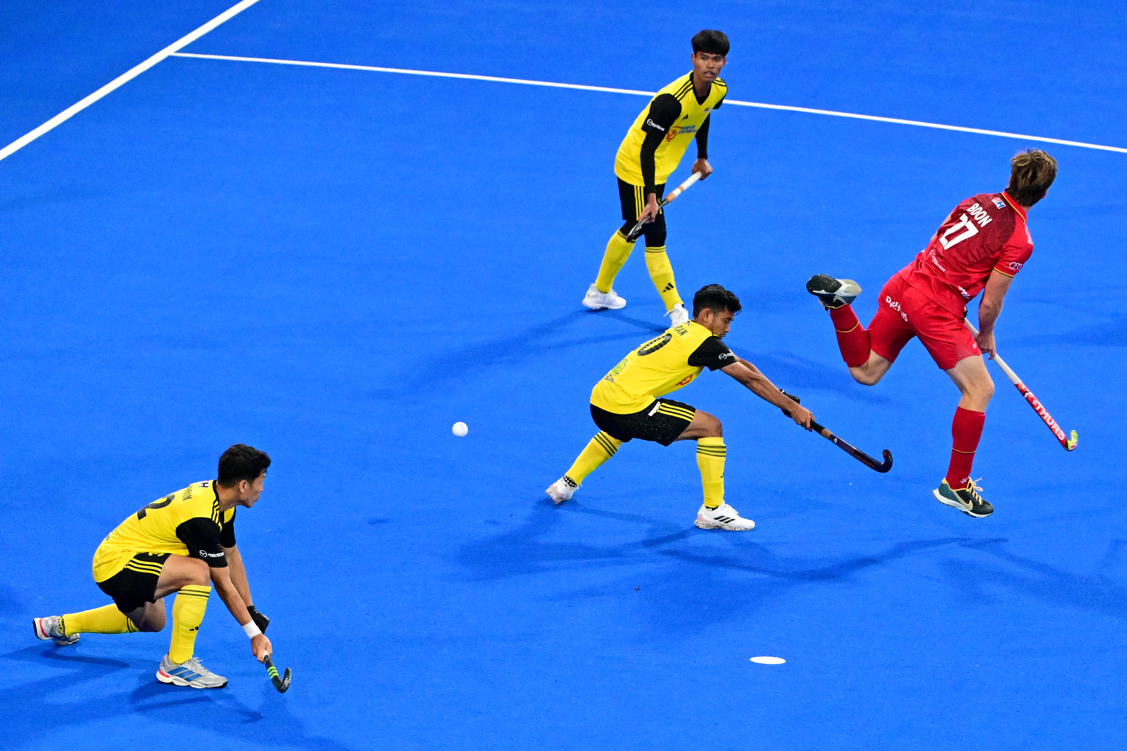Malaysia's Ashran Hamsani and Belgium's Tom Boon pictured in action during a hockey game between Belgian Lions and Malaysia, the third (out of three) matches during the group stage of the men's 2026 Hockey World Cup, Wednesday 19 August 2026 in Wavre. The 2026 edition of the Hockey World Cup takes place in Belgium and The Netherlands from August 15 to August 30. BELGA PHOTO DIRK WAEM