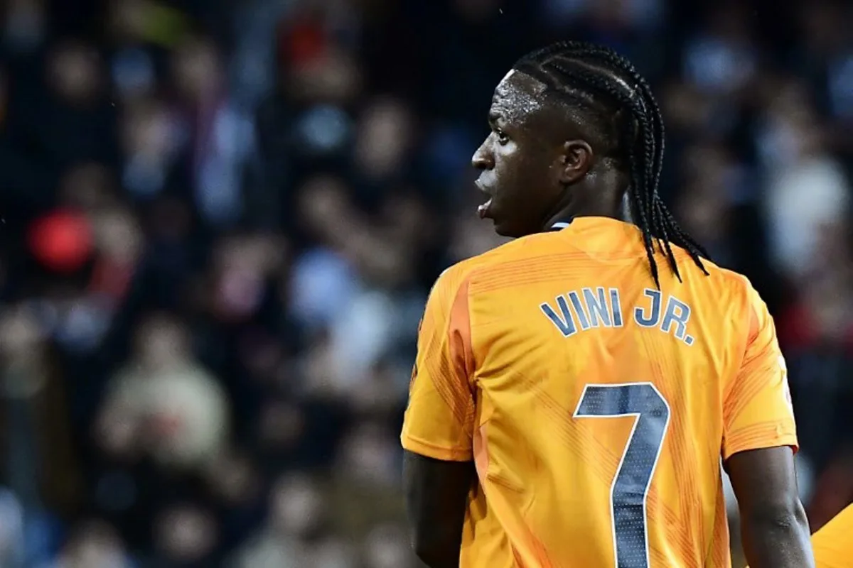 Real Madrid's Brazilian forward #07 Vinicius Junior looks on during the Spanish league football match between Valencia CF and Real Madrid CF at the Mestalla stadium in Valencia on January 3, 2025.  JOSE JORDAN / AFP