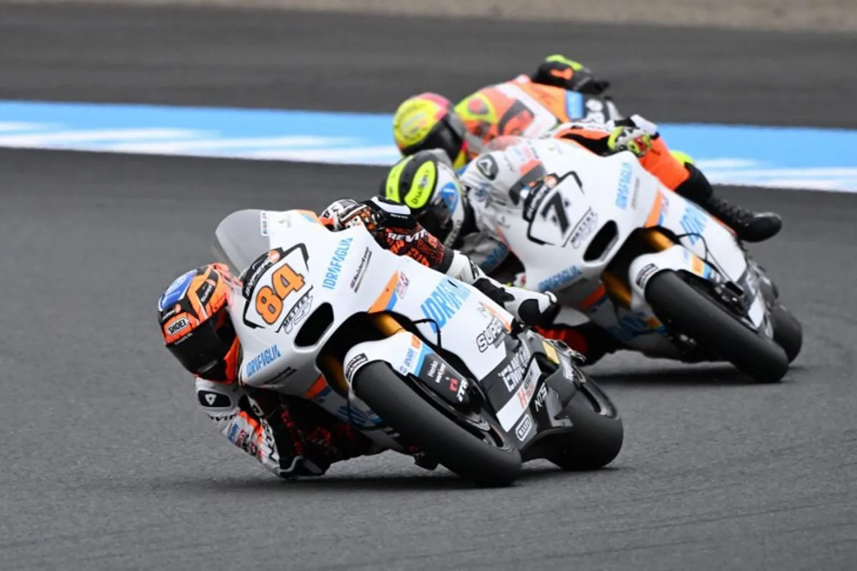 RW Racing GP rider Zonta Van Den Goorbergh of the Netherlands leads his teammate Barry Baltus of Belgium (#7) during the Moto2 class qualifying session of the MotoGP Japanese Grand Prix at Mobility Resort Motegi in Motegi, Tochigi prefecture on October 5, 2024.  Toshifumi KITAMURA / AFP