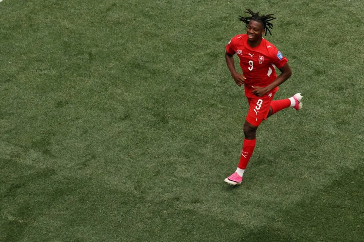 Switzerland's midfielder #09 Johan Manzambi celebrates scoring his team's third goal during the 2026 World Cup Group B football match between Switzerland and Bosnia and Herzegovina at Los Angeles Stadium in Inglewood on June 18, 2026.   Etienne Laurent / AFP
