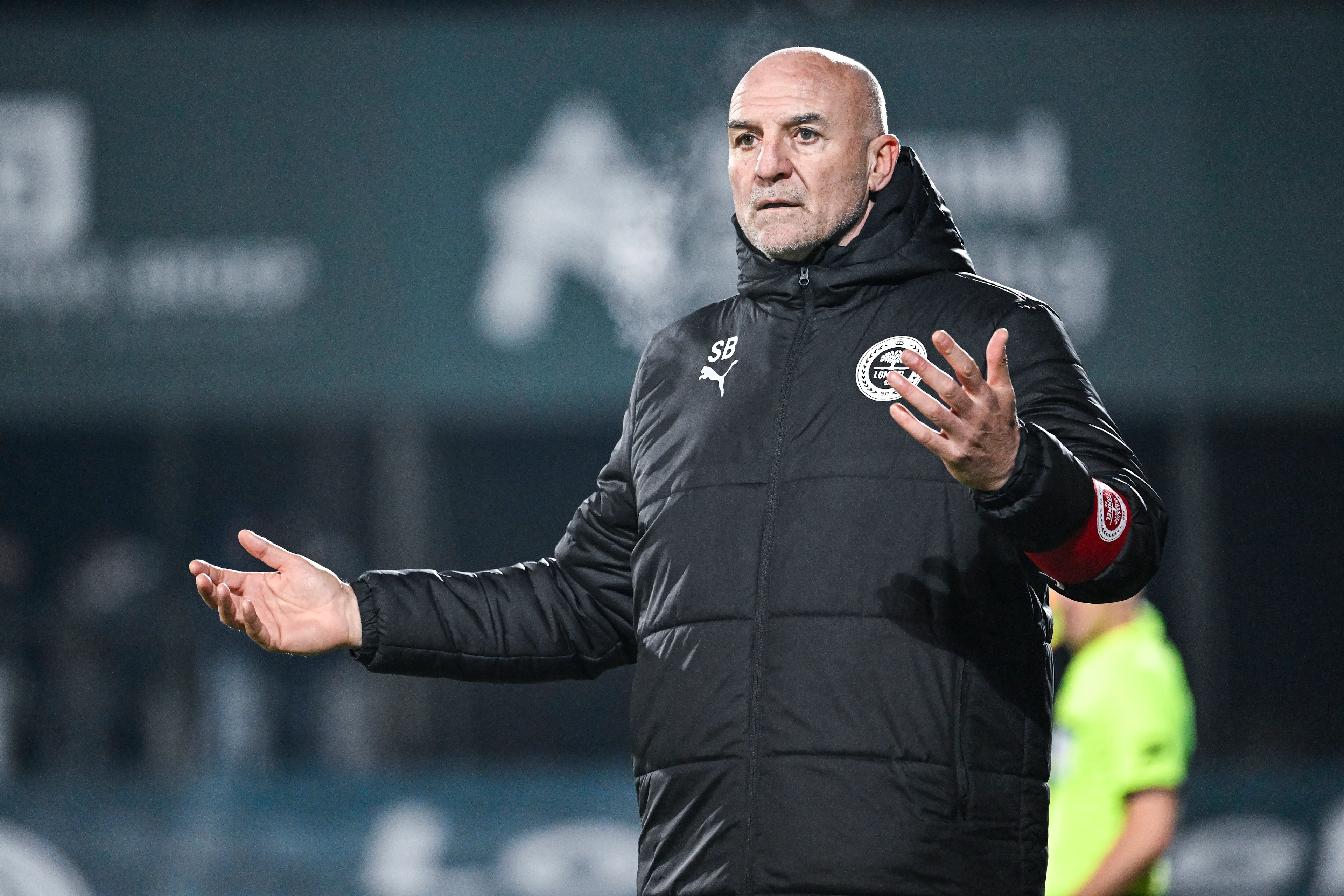 Lommel's head coach Steve Bould reacts during a soccer match between Lommel SK and Lokeren-Temse, in Lommel, on day 13 of the 2024-2025 'Challenger Pro League' 1B second division of the Belgian championship, Friday 29 November 2024. BELGA PHOTO TOM GOYVAERTS