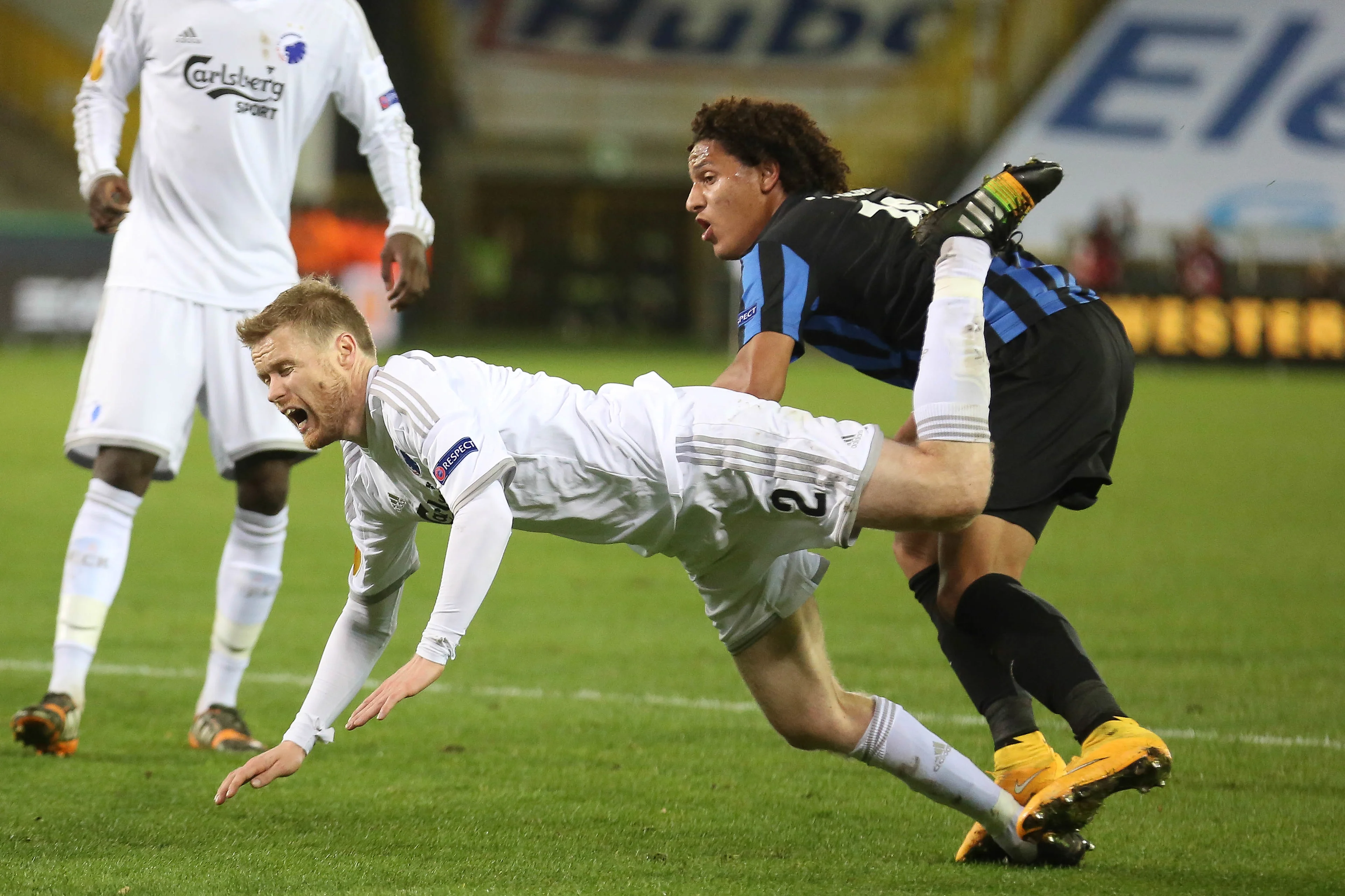 20141023 - BRUGGE, BELGIUM: Kobenhavn's Tom Hogli and Club's Felipe Gedoz Da Conceicao pictured during a game between Belgian soccer team Club Brugge and Danish team FC Kobenhavn, Thursday 23 October 2014, in Brugge stadium. It is the third day of the group stage of the UEFA Europa League competition, in group B. BELGA PHOTO BRUNO FAHY