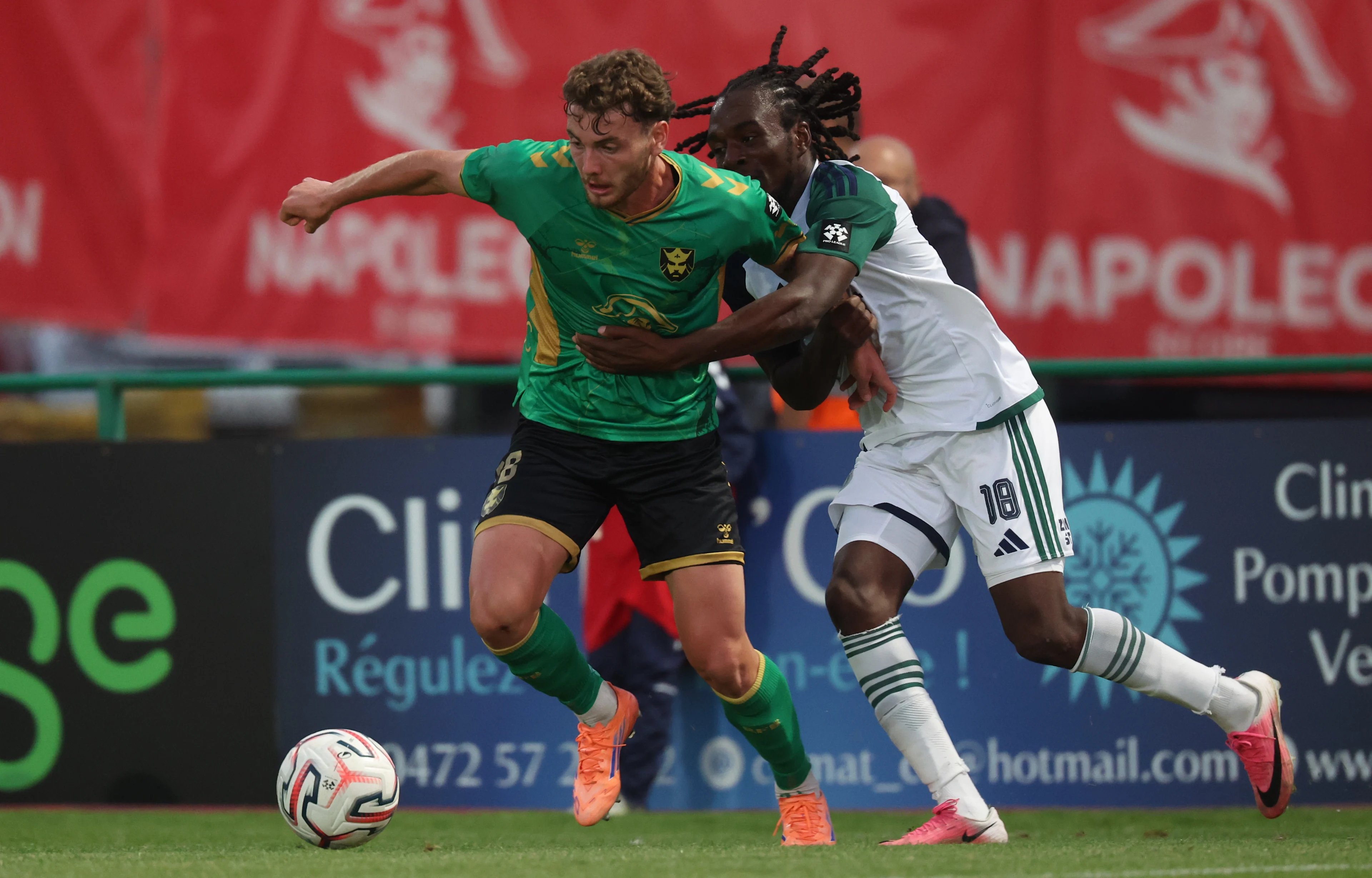Hasselt's Javan Ngoyi and Francs Borains' Romeo Monticelli fight for the ball during a soccer match between Royal Francs Borains and Sporting Hasselt, Sunday 23 August 2026 in Boussu, on day 2 of the 2026-2027 'Challenger Pro League' 1B second division of the Belgian championship. BELGA PHOTO VIRGINIE LEFOUR