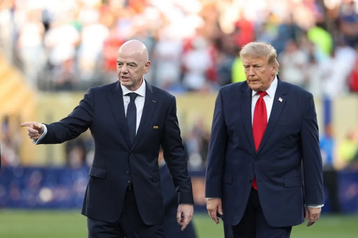 FIFA President Gianni Infantino (L) and US President Donald Trump arrive for the final ceremony after the 2026 World Cup football tournament final match between Spain and Argentina at the New York/New Jersey Stadium in East Rutherford on July 19, 2026. Odd ANDERSEN / AFP
