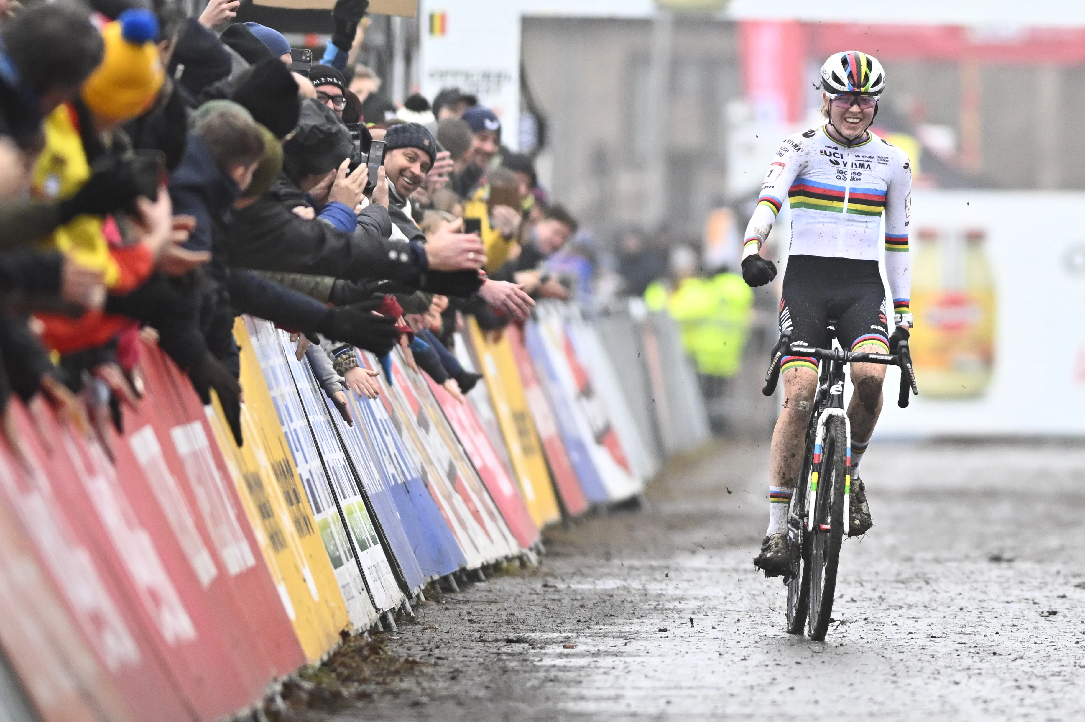 Dutch Fem Van Empel celebrates as she crosses the finish line to win the women's elite race of the World Cup cyclocross cycling event in Gavere on Thursday 26 December 2024, stage 7 (out of 12) of the UCI World Cup competition. BELGA PHOTO JASPER JACOBS