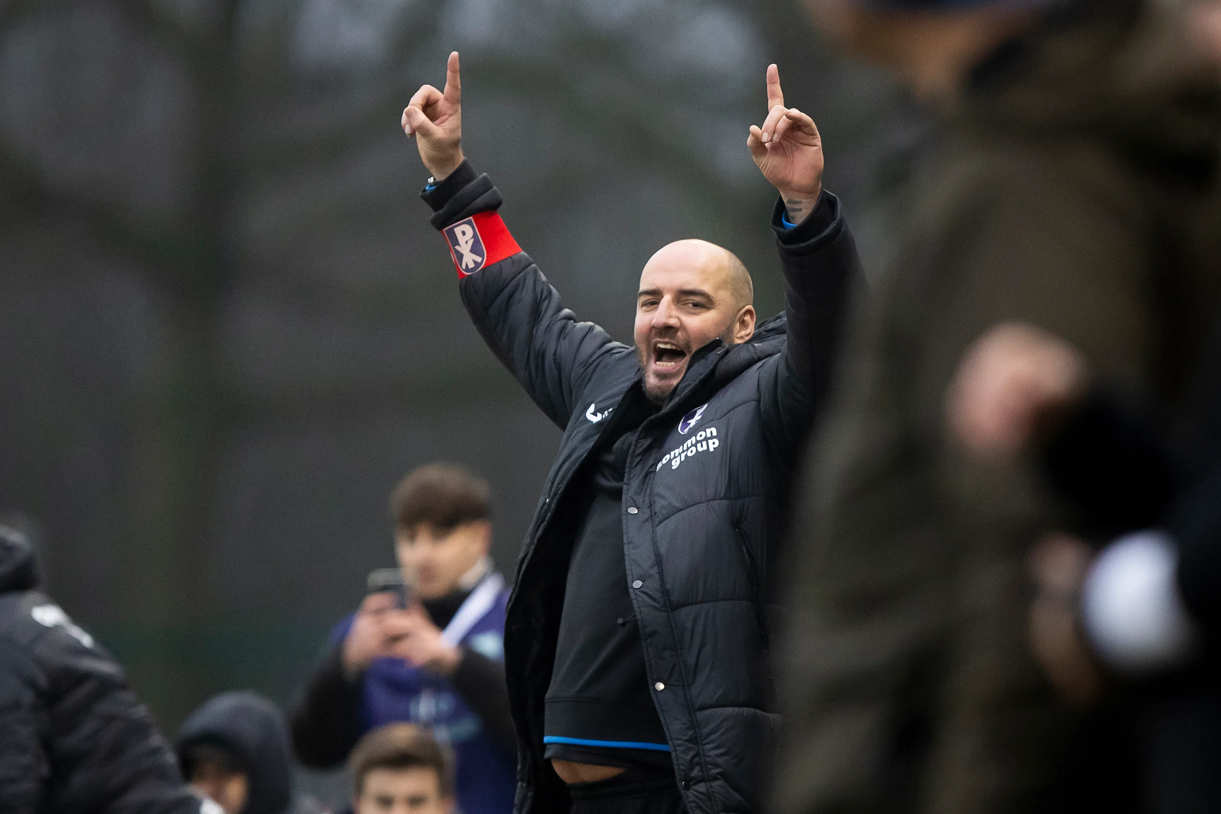 Patro Eisden's head coach Stijn Stijnen celebrates after winning a soccer match between Jong Genk and Patro Eisden Maasmechelen, Sunday 15 December 2024 in Geel, on day 15 of the 2024-2025 season of the 'Challenger Pro League' second division of the Belgian championship. BELGA PHOTO KRISTOF VAN ACCOM