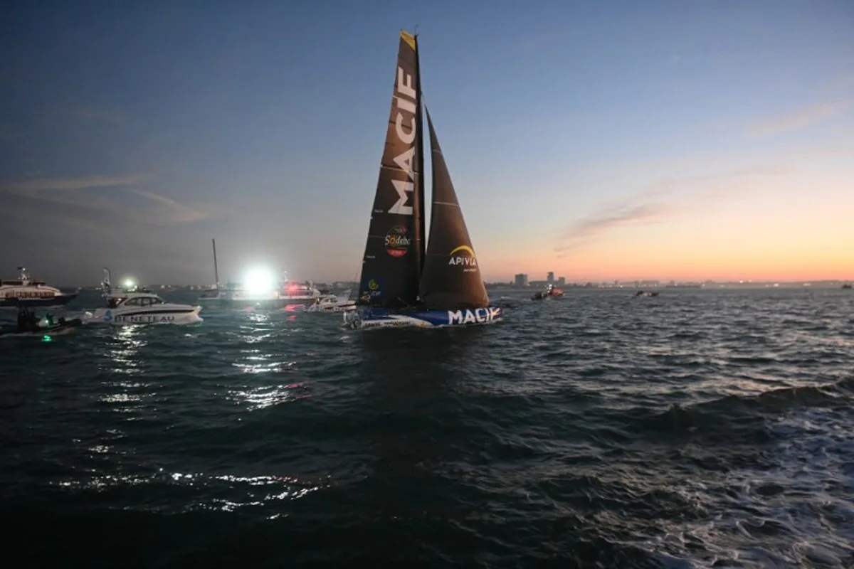 French skipper Charlie Dalin sails his Imoca 60 monohull "Macif" prior to cross the finish line to win the 10th edition of the Vendee Globe around the world monohull solo sailing race, off the coast of Les Sables-d'Olonne, western France, early on January 14, 2025.  Sébastien SALOM-GOMIS / AFP