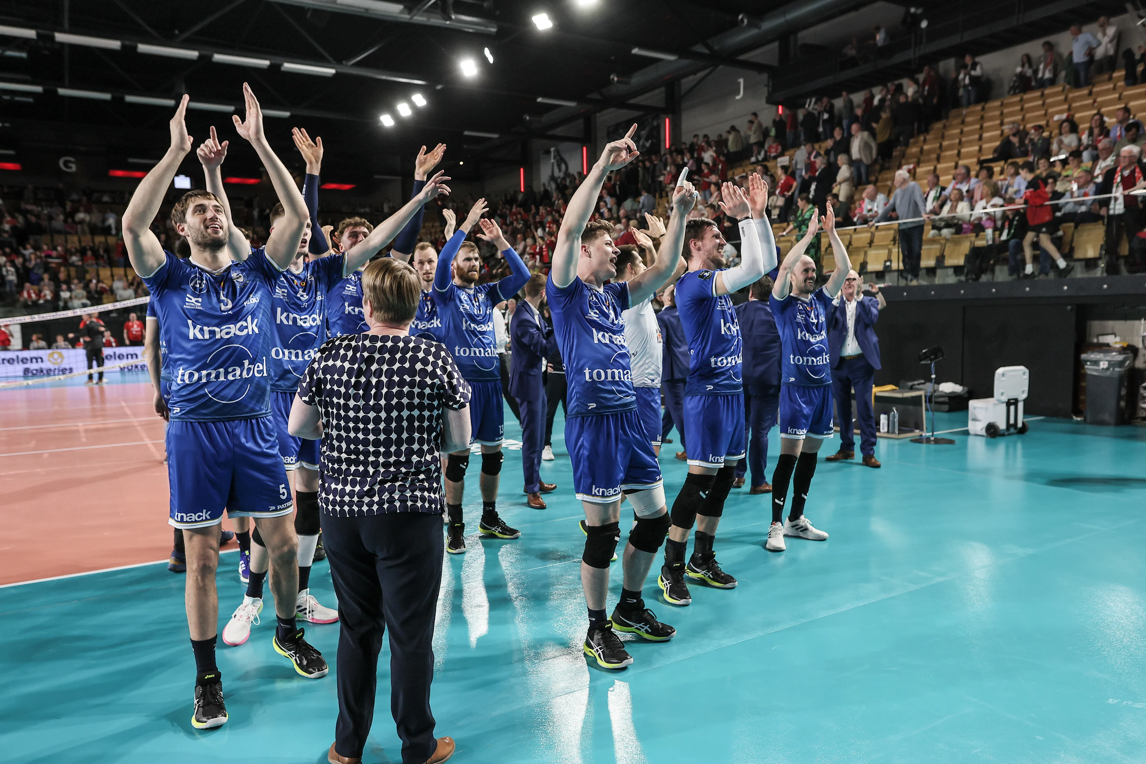 Roeselare's players celebrate after winning a volleyball match between Greenyard Maaseik and Knack Roeselare, Sunday 28 April 2024 in Maaseik, the last match of the best-of-five finals in the Play Offs of the Belgian volleyball competition. BELGA PHOTO BRUNO FAHY