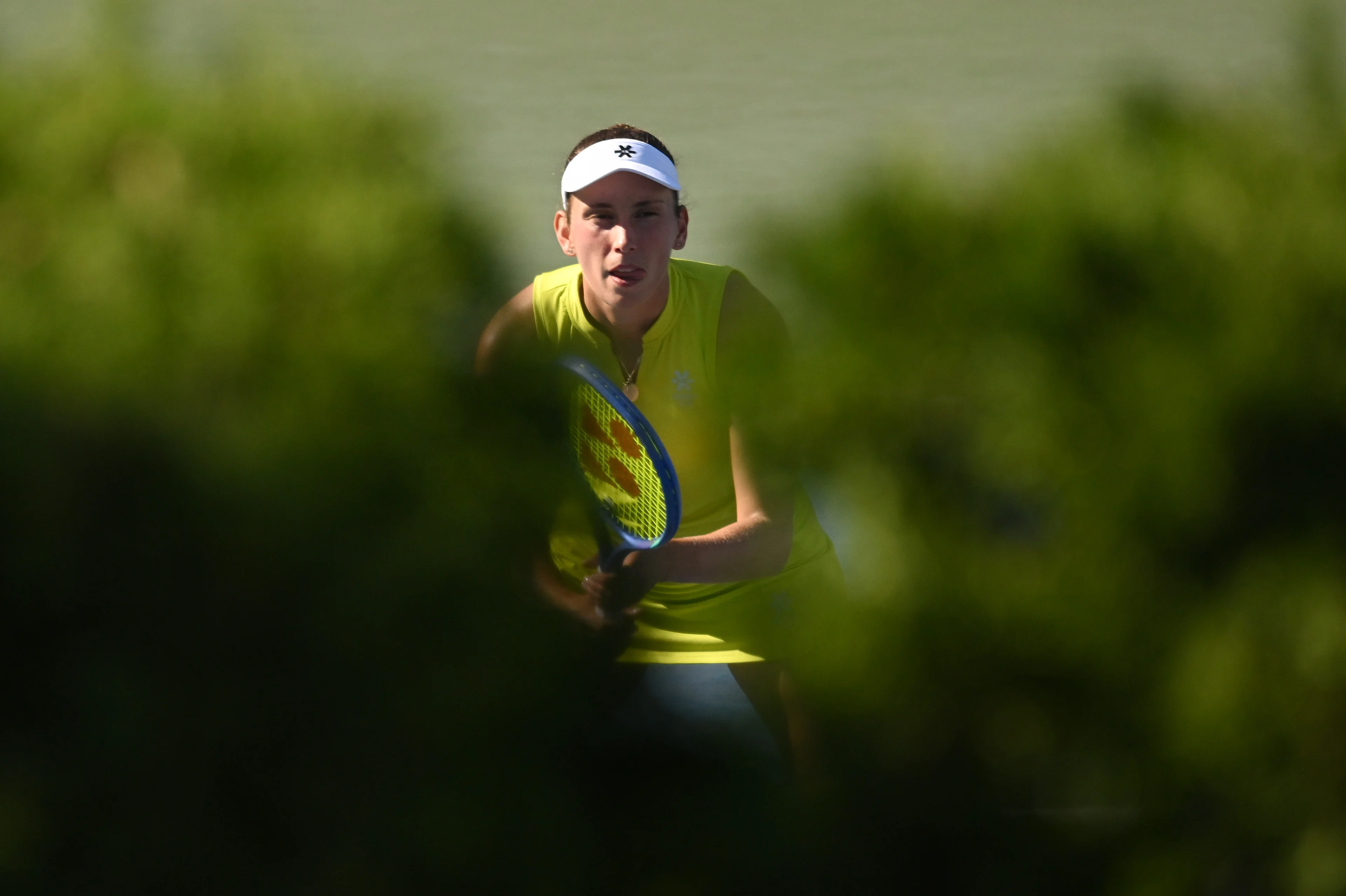 Belgian Elise Mertens (yellow) pictured during a tennis match with Kudermetova against US pair Brantmeier-Hamilton, in the second round of the women's doubles of the 2025 US Open Grand Slam tennis tournament in New York City, USA, Saturday 30 August 2025. BELGA PHOTO TONY BEHAR