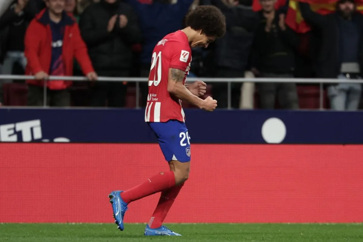 Atletico Madrid's Belgian midfielder #20 Axel Witsel celebrates scoring his team's first goal during the Spanish league football match between Club Atletico de Madrid and Villarreal CF at the Civitas Metropolitano stadium in Madrid on November 12, 2023.  Thomas COEX / AFP