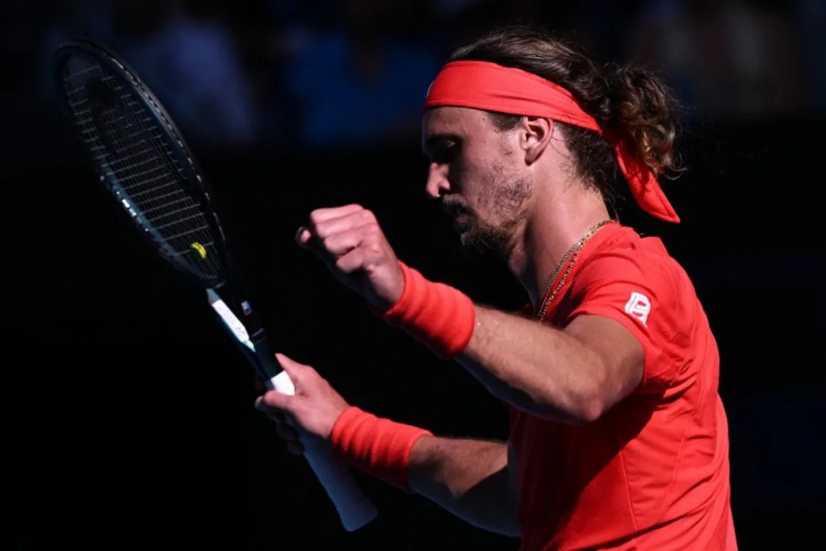 Germany's Alexander Zverev celebrates the match point against USA's Tommy Paul during their men's singles quarterfinal match on day ten of the Australian Open tennis tournament in Melbourne on January 21, 2025.  WILLIAM WEST / AFP