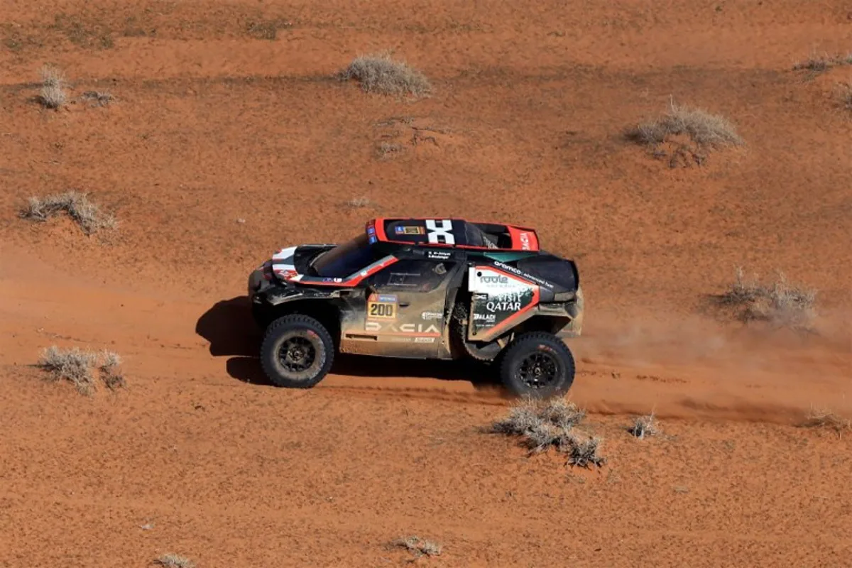 Dacia Sandriders' Qatari pilot Nasser Al Attiyah and French co-pilot Edouard Boulanger compete during stage 4 of the 47th Dakar Rally 2025 between Al Henakiyak and Alula, on January 8, 2025.  Valery HACHE / AFP