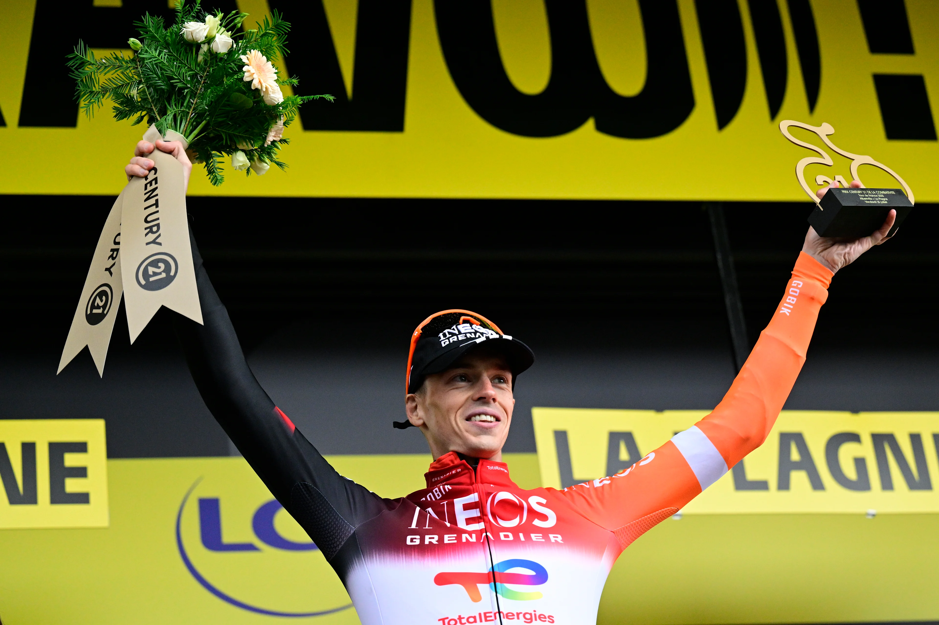 Dutch Thymen Arensman of Ineos Grenadiers celebrates on the podium with the combativity award after stage 19 of the 2025 Tour de France cycling race, from Albertville to La Plagne (130km), on Friday 25 July 2025 in France. The 112th edition of the Tour de France starts on Saturday 5 July in Lille, France, and will finish in Paris, France on the 27th of July. BELGA PHOTO DIRK WAEM