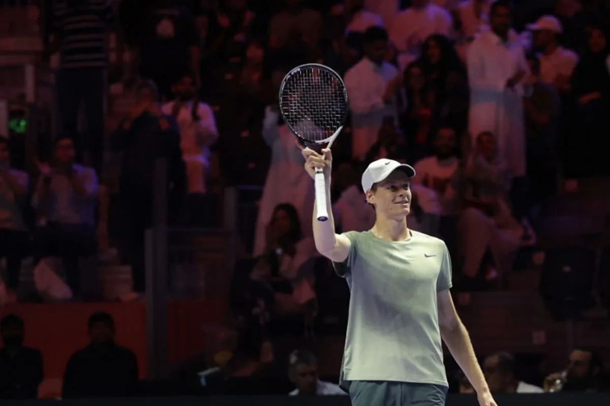 Italy's Jannik Sinner reacts during his quarter-final tennis match against Russia's Daniil Medvedev in the "6 Kings Slam" exhibition tournament in Riyadh on October 16, 2024.  Fayez NURELDINE / AFP