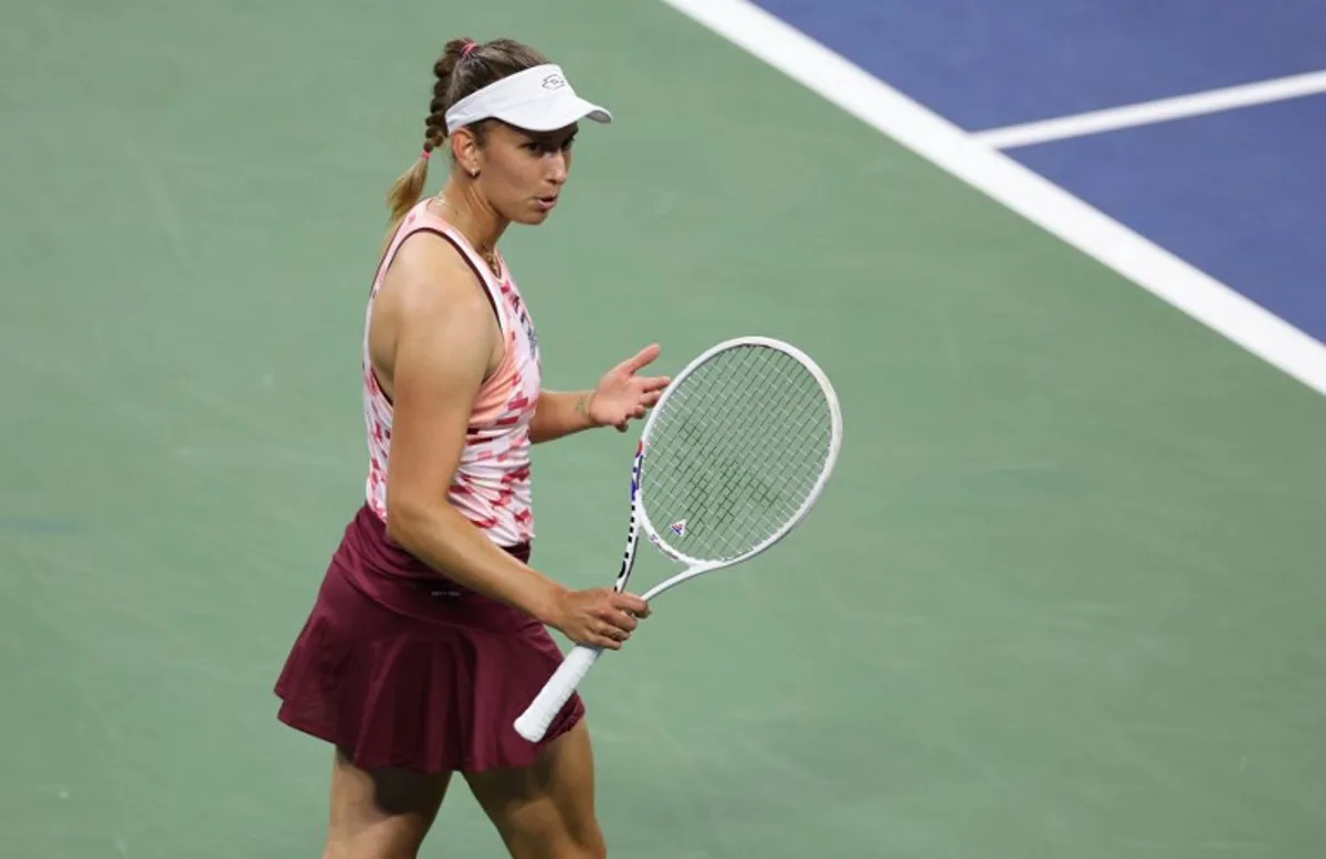 Belgium's Elise Mertens talks to her coach as she plays against USA's Madison Keys during their women's singles third round match on day five of the US Open tennis tournament at the USTA Billie Jean King National Tennis Center in New York City, on August 30, 2024.  CHARLY TRIBALLEAU / AFP