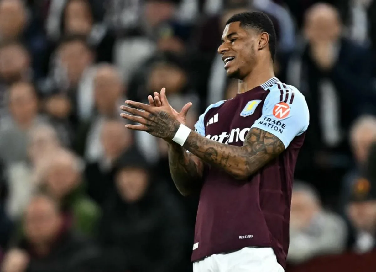 Aston Villa's English striker #09 Marcus Rashford reacts after failing to score during the UEFA Champions League quarter-final second-leg football match between Aston Villa and Paris Saint-Germain at Villa Park in Birmingham, central England on April 15, 2025. Paul ELLIS / AFP
