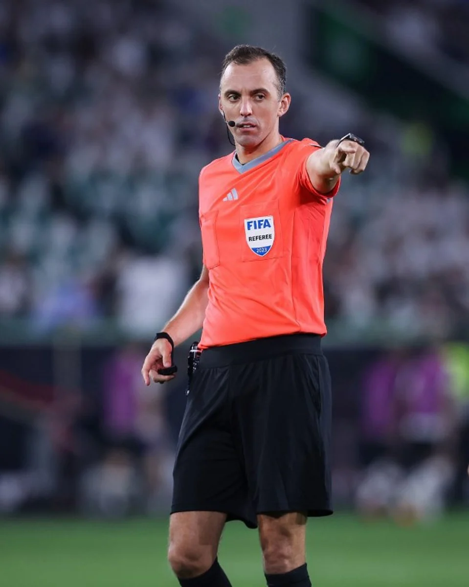 Portuguese referee Joao Pinheiro gestures during the friendly football match between Germany and Japan at the Volkswagen Arena in Wolfsburg, central Germany, on September 9, 2023.  Ronny Hartmann / AFP