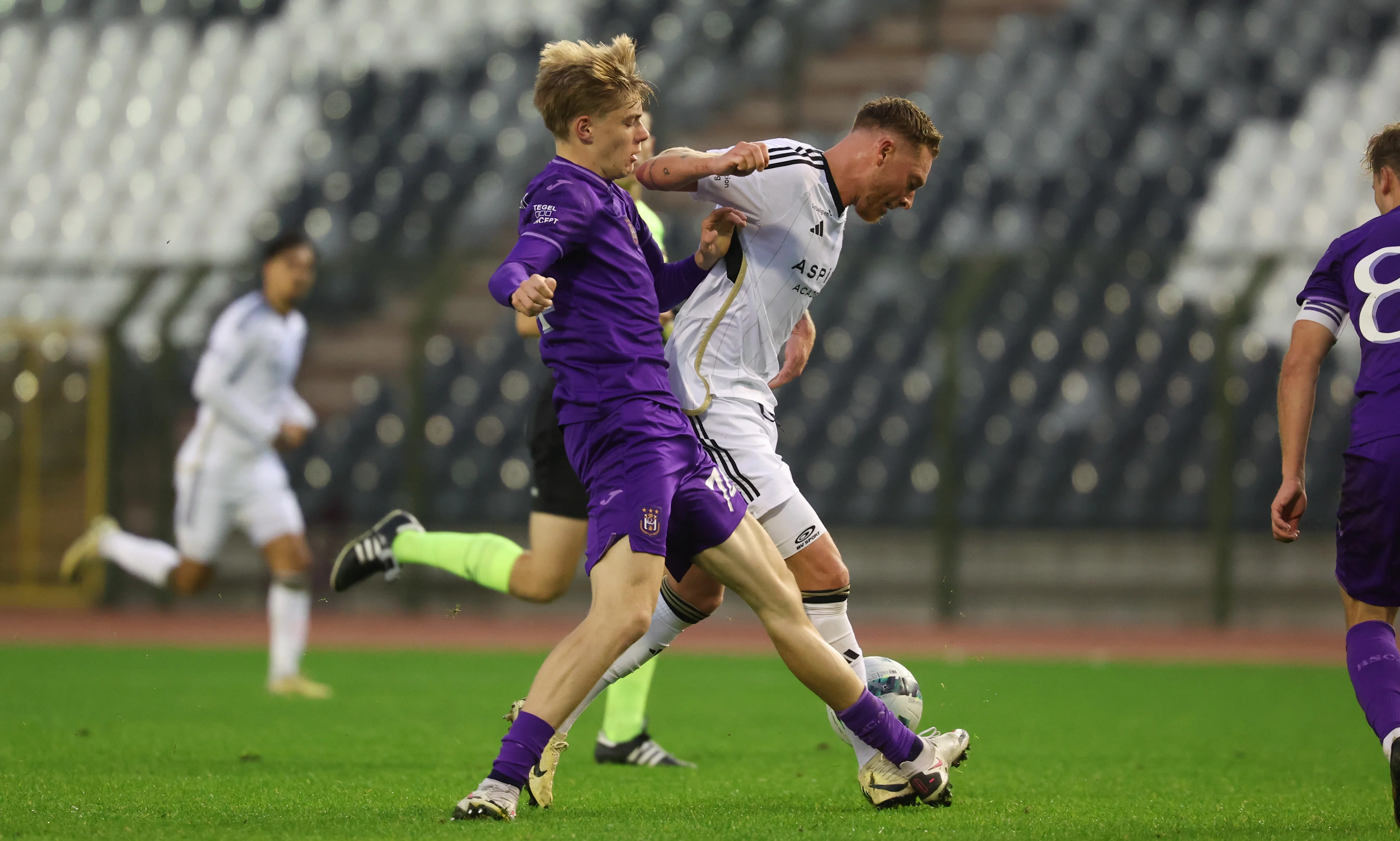 RSCA Futures' Nathan De Cat and Eupen's Renaud Emond fight for the ball during a soccer match between RSCA Futures (U21) and KAS Eupen, Saturday 02 November 2024 in Brussels, on day 10 of the 2024-2025 'Challenger Pro League' second division of the Belgian championship. BELGA PHOTO VIRGINIE LEFOUR