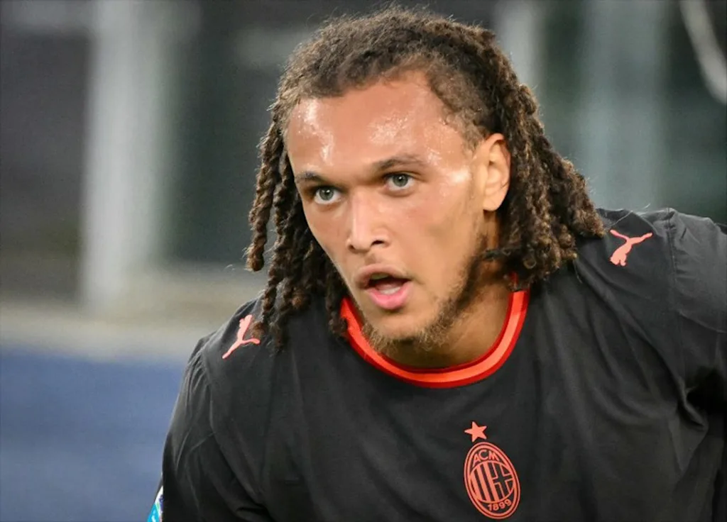 AC Milan's Belgian midfielder #22 Diego Moreira reacts after scoring Milan's second goal during the Italian Serie A football match between Lazio and AC Milan at the Olympic Stadium in Rome on September 12, 2026.  Alberto PIZZOLI / AFP
